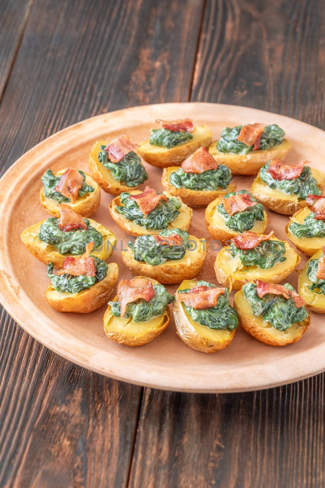 Roasted baby potatoes with creamy spinach and bacon