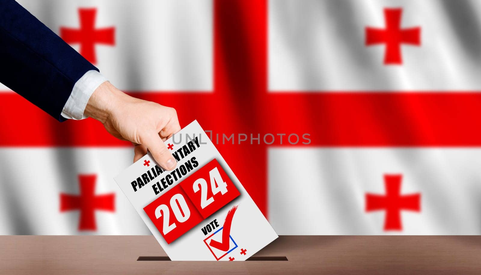 Georgian parliamentary elections. Hand holding ballot in voting ballot box with Georgian flag in background