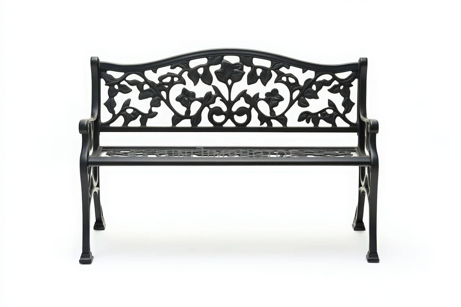 A stylish black garden bench, featuring intricate floral patterns, stands alone in a minimalist setting, inviting relaxation and contemplation in an outdoor space.