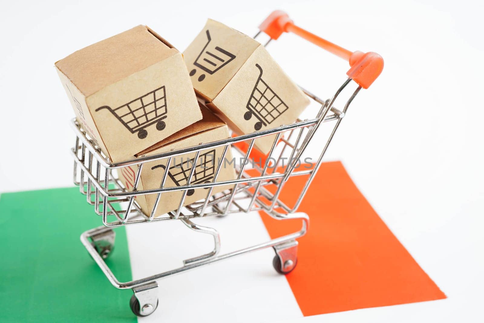 Online shopping, Shopping cart box on Italy flag, import export, finance commerce.