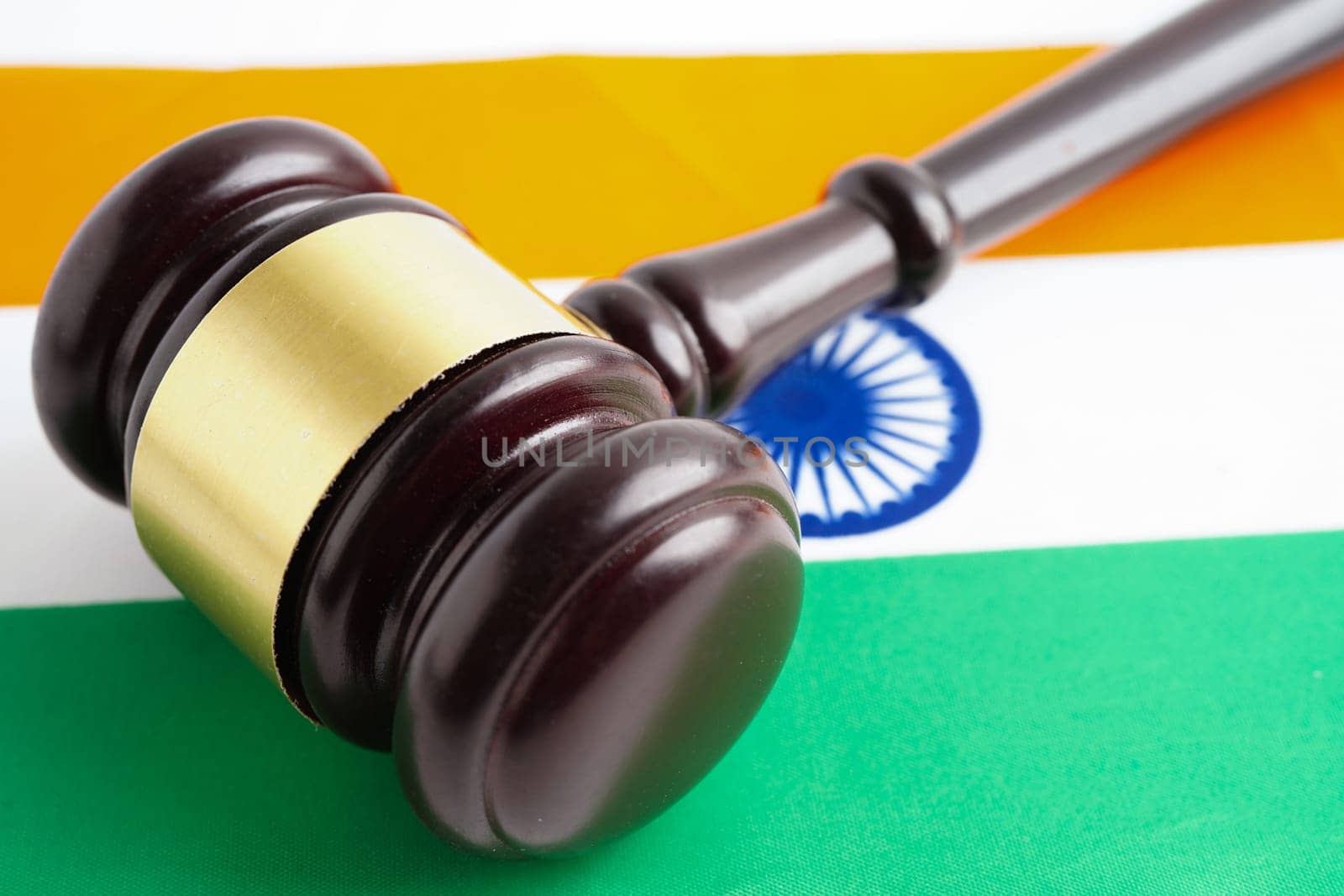 India, Legal, justice and agreement, wooden court gavel on flag.