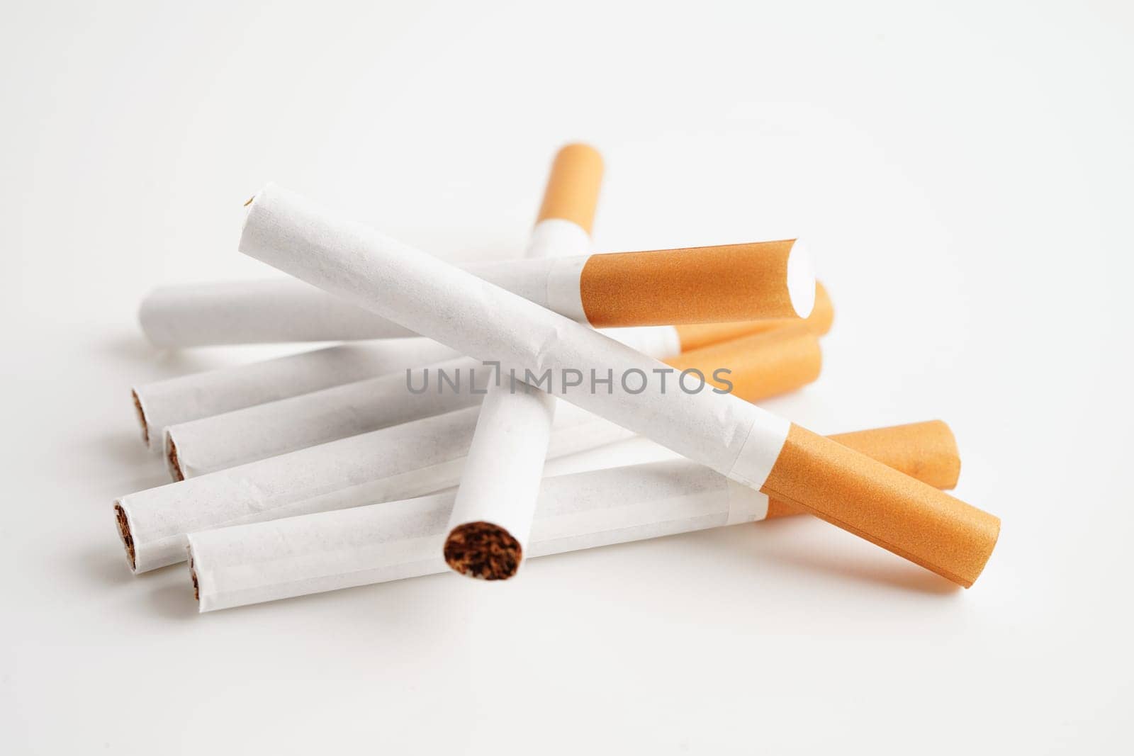Cigarette, roll tobacco in paper with filter tube, No smoking concept.