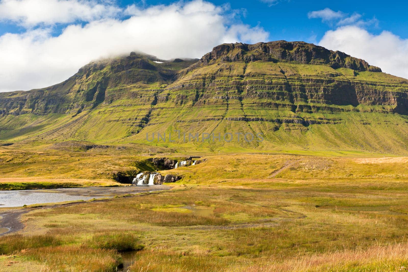 Western Icelandic mountain landscape under a blue summer sky. Snaefellsnes peninsula