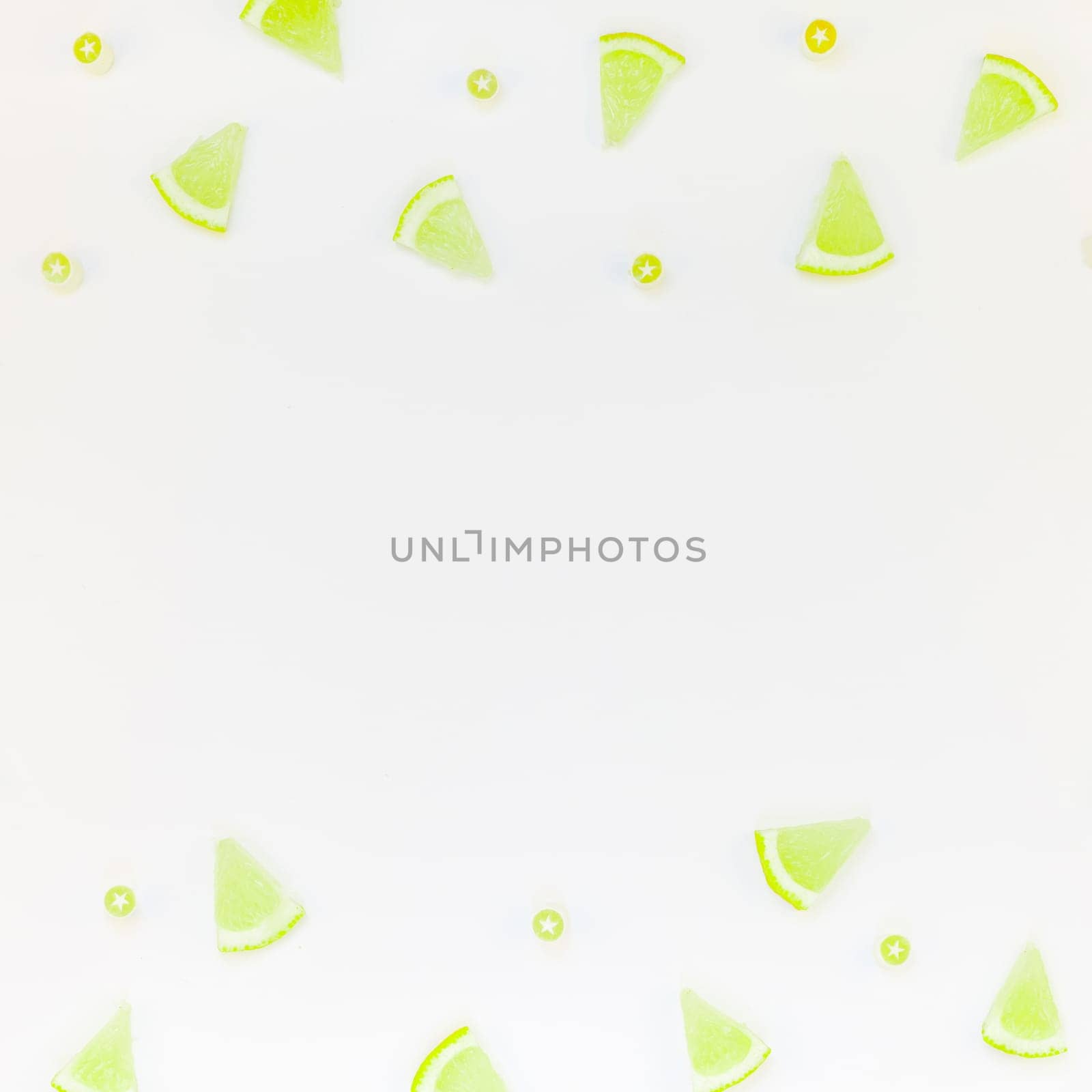 Square flatlay overhead top view citrus lemon slices pattern frame white table background with copyspace. Hot summer refreshment lemonade concept. Beverage ingredients arranged