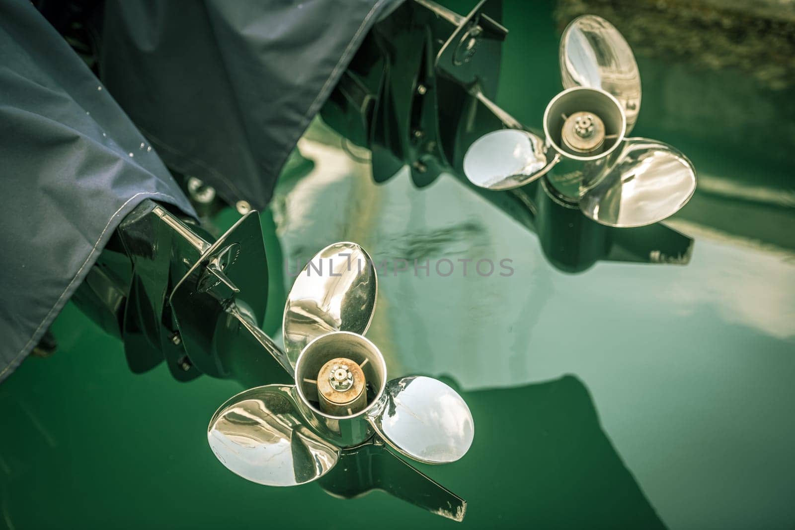 two motor boat screws horizontal day shot