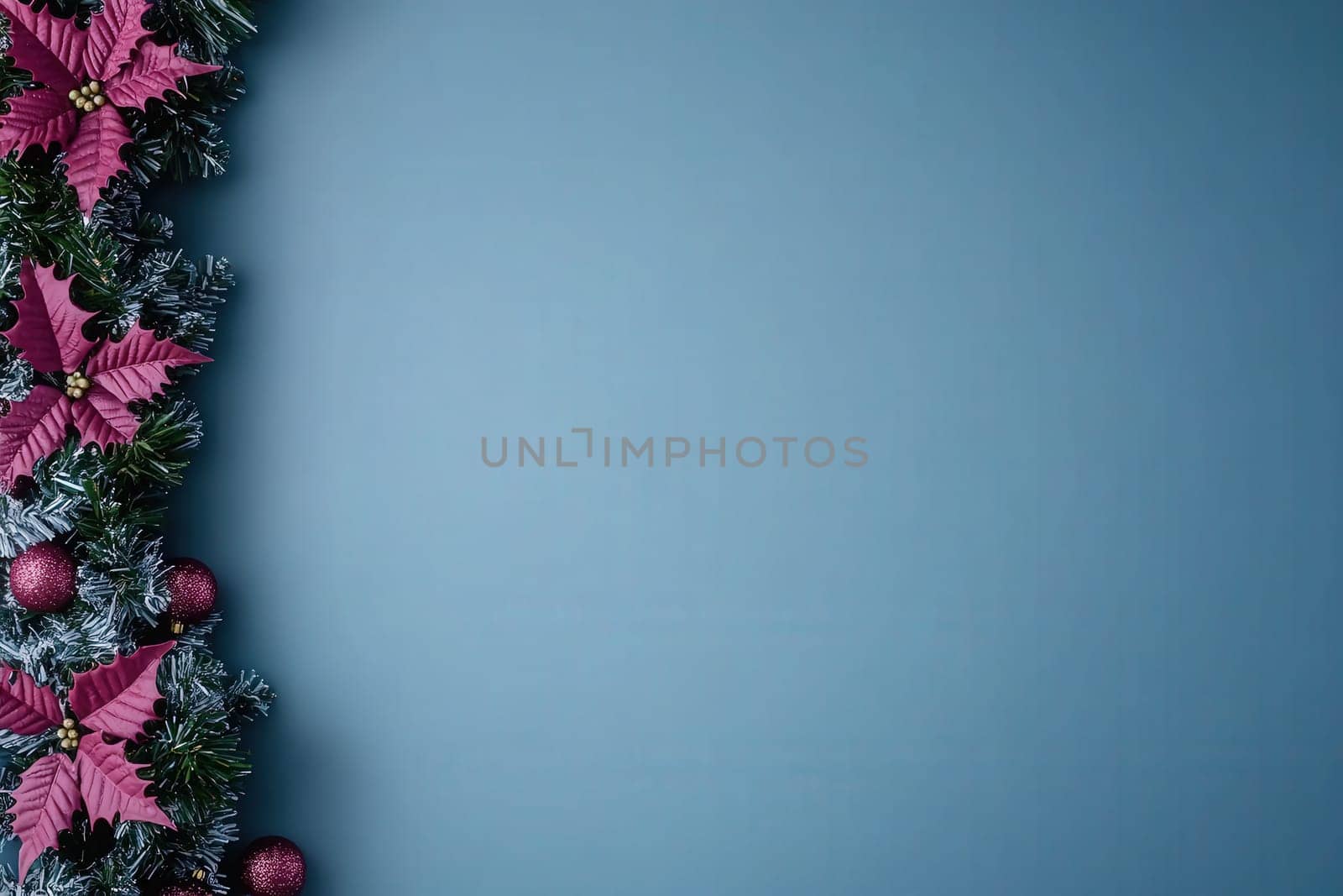 Vibrant holiday garlands adorned with pink poinsettias and colorful ornaments are artistically arranged against a clean, solid backdrop. Perfect for festive decorations and celebrations.