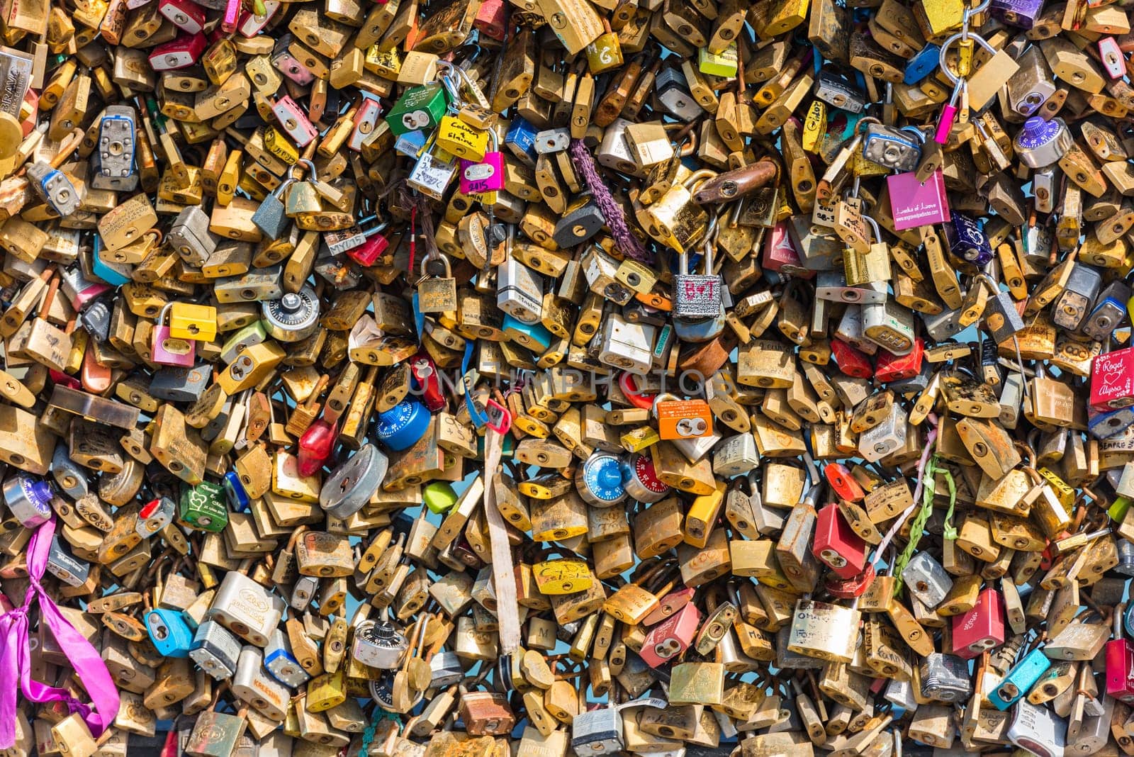 FRANCE, PARIS - JUNE 01: Pont des arts - bridge across Seine river crammed with lovers padlocks on June 01, 2015.