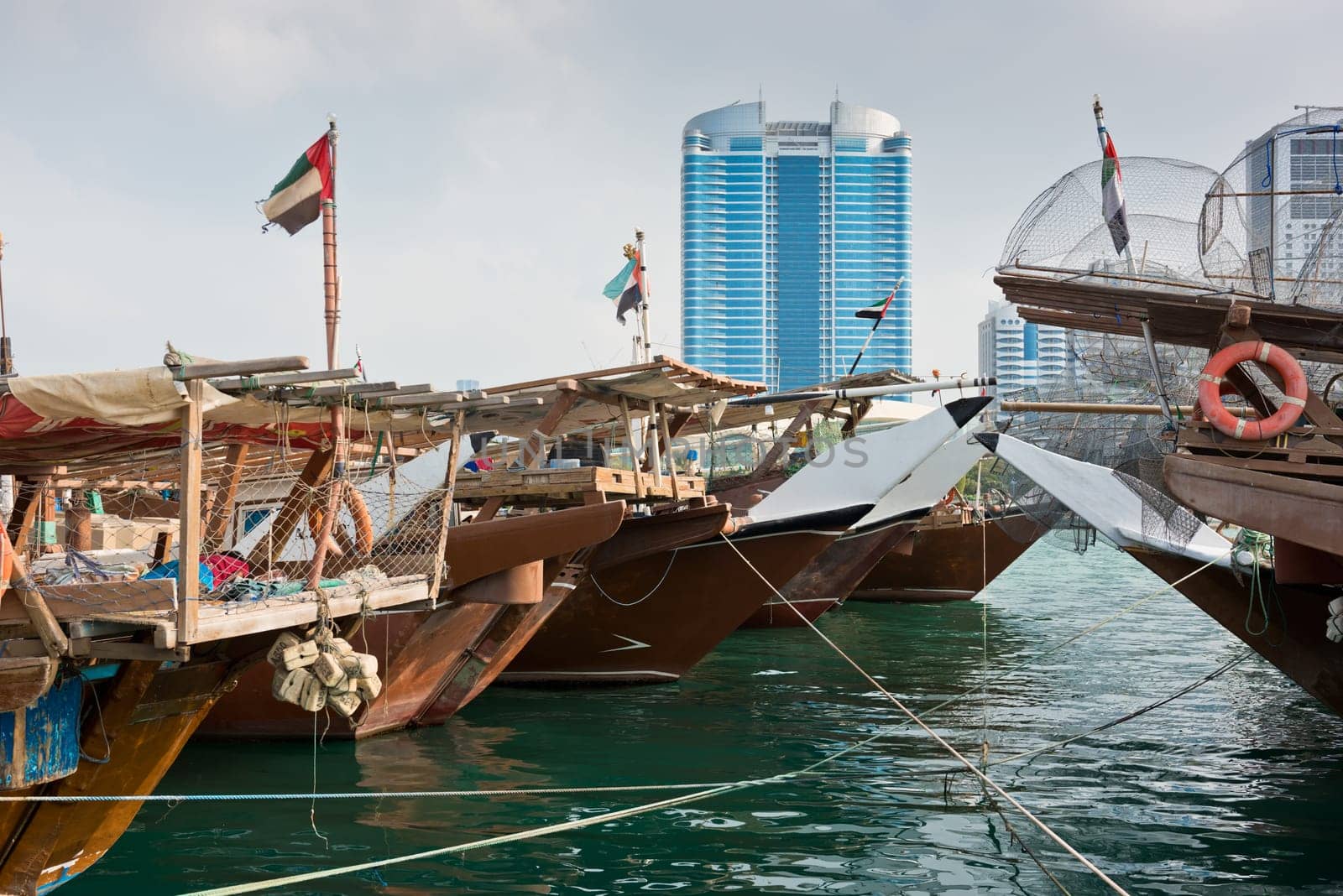 Old fishing boats in Abu Dhabi, UAE. Overcast day