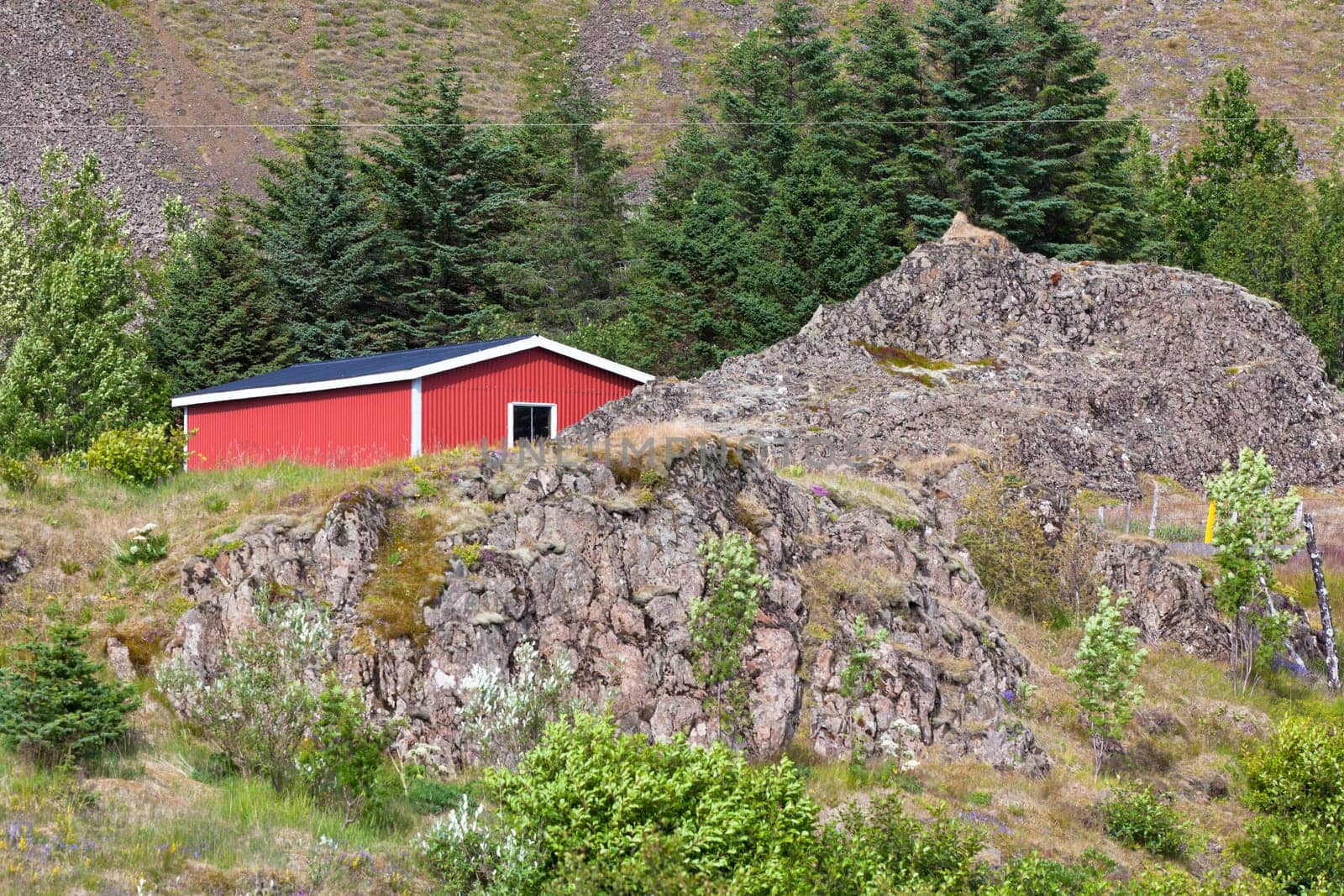 East Iceland Nature Landscape with rocks range and red house