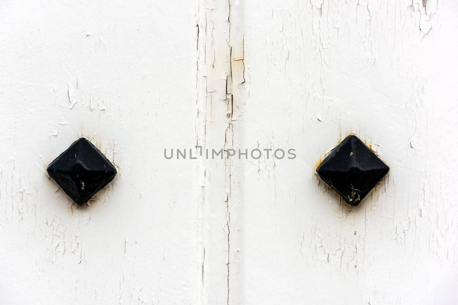 window with closed white wooden shutters. background photo