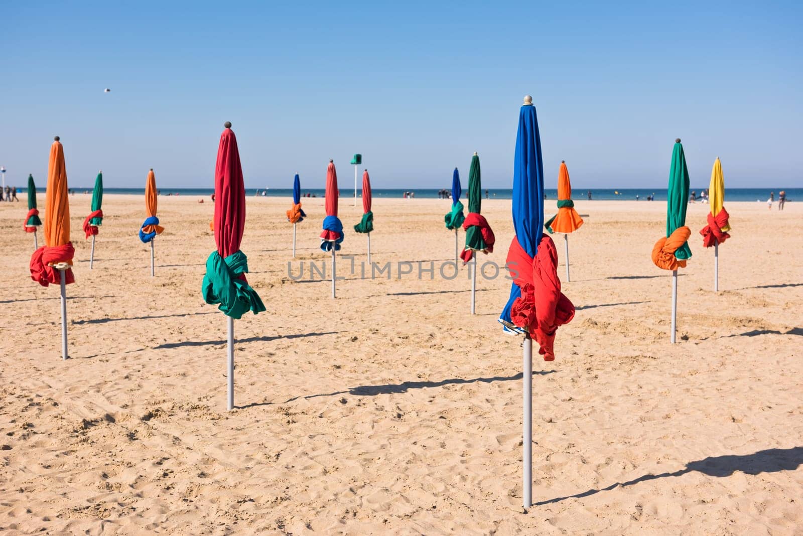 The famous colorful parasols on Deauville beach, Normandy, Northern France