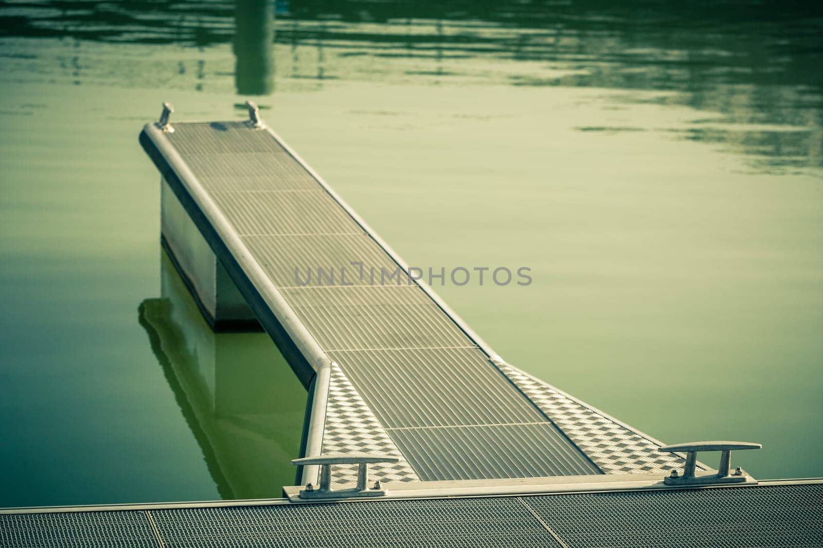 Modern Pier in the water. Shot with a selective focus