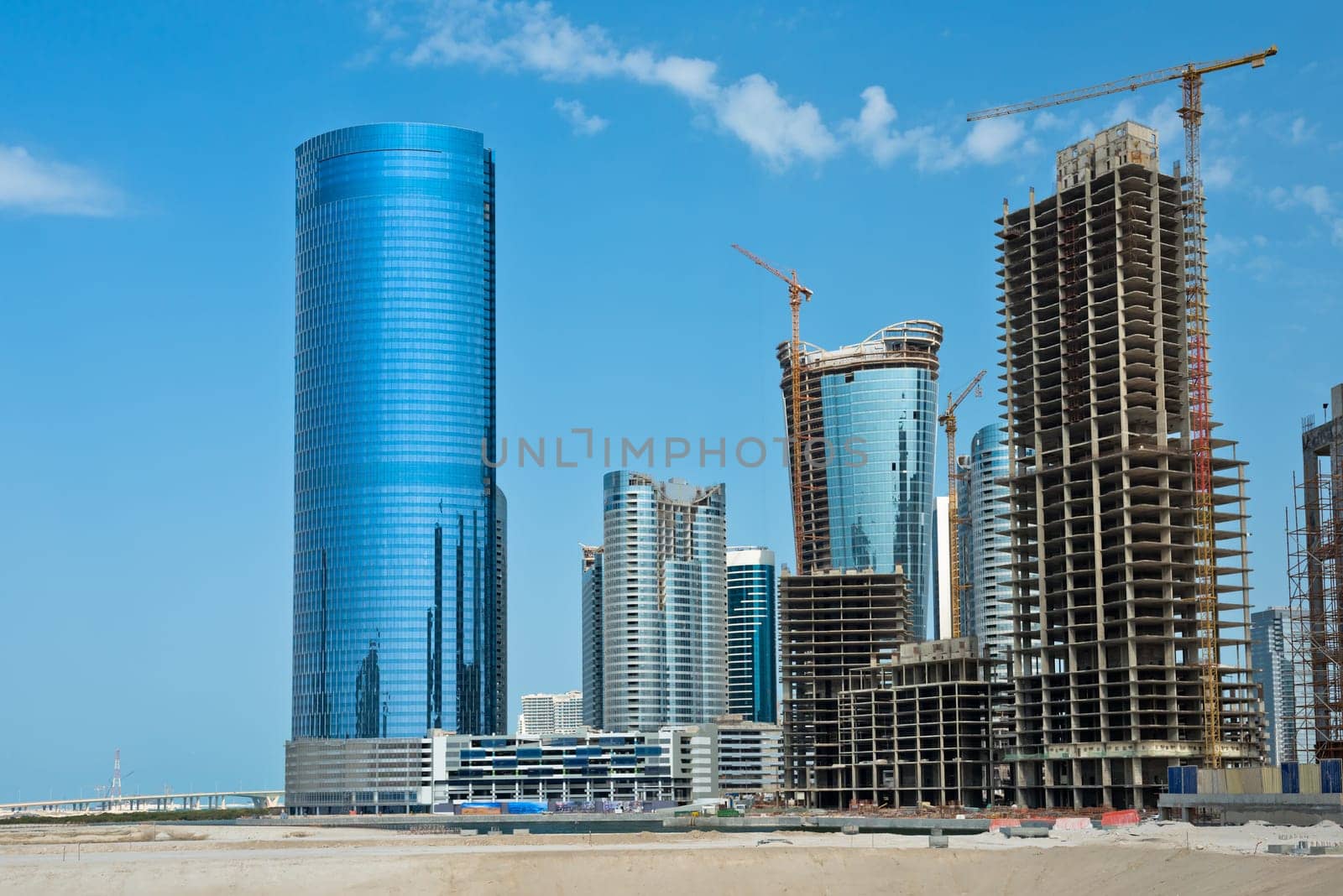 Abu Dhabi new district with skyscrapers construction. United Arab Emirates
