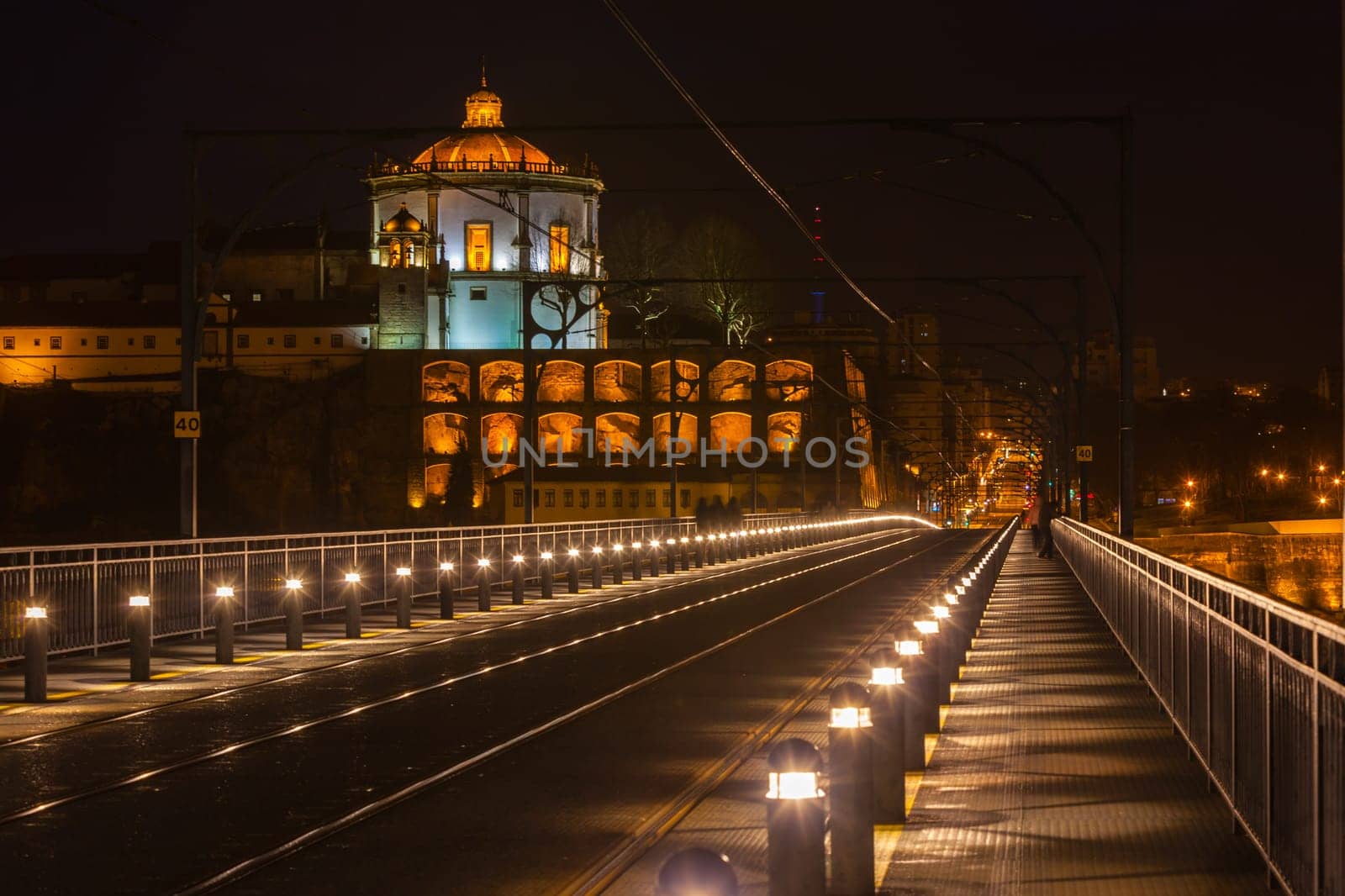 Bridge of Dom Luiz in Porto at night. Horizontal shot