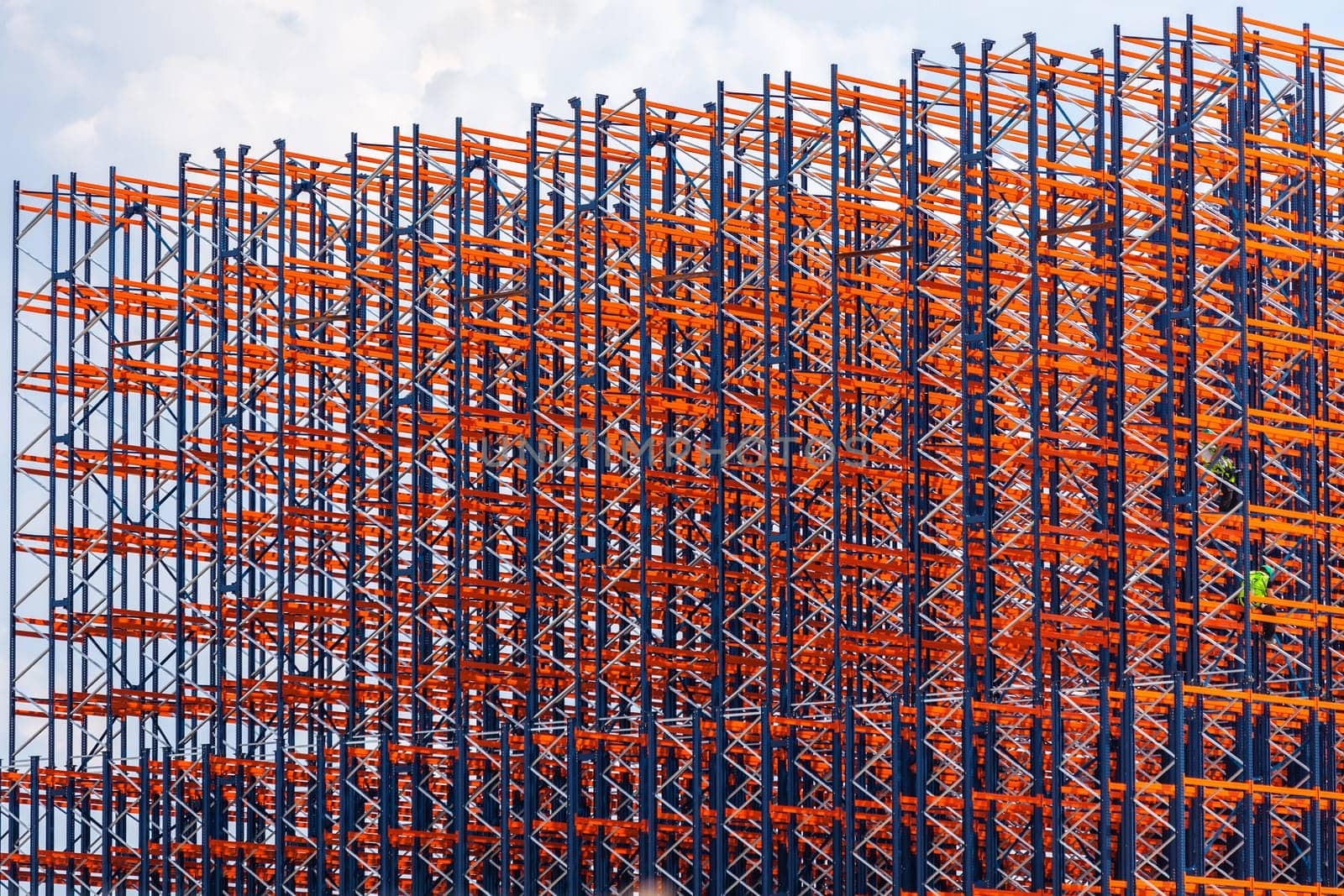 Red metal construction on the sky background