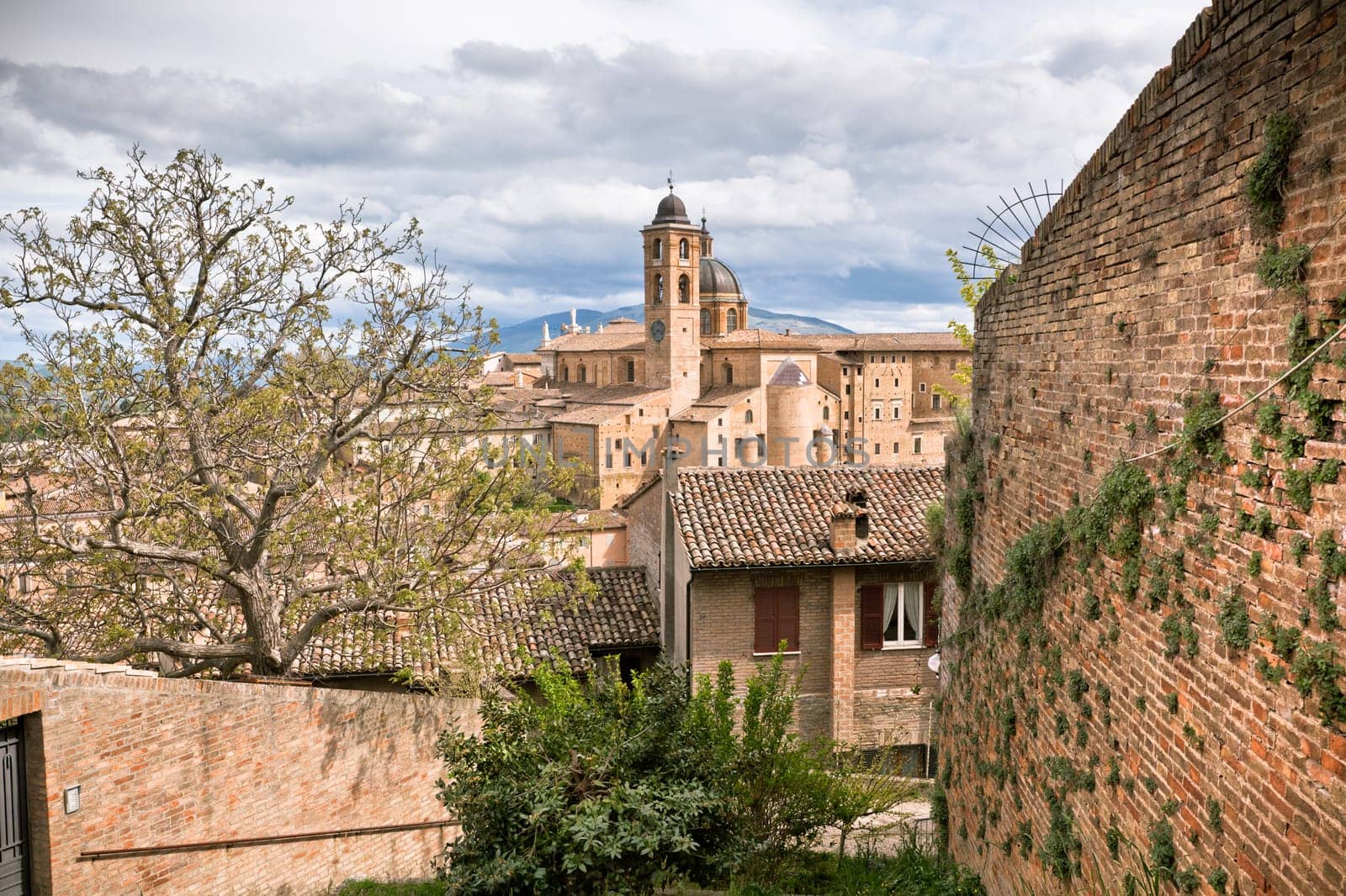 Old Urbino, Italy, cityscape at dull day. Horizontal toned and vignetted image