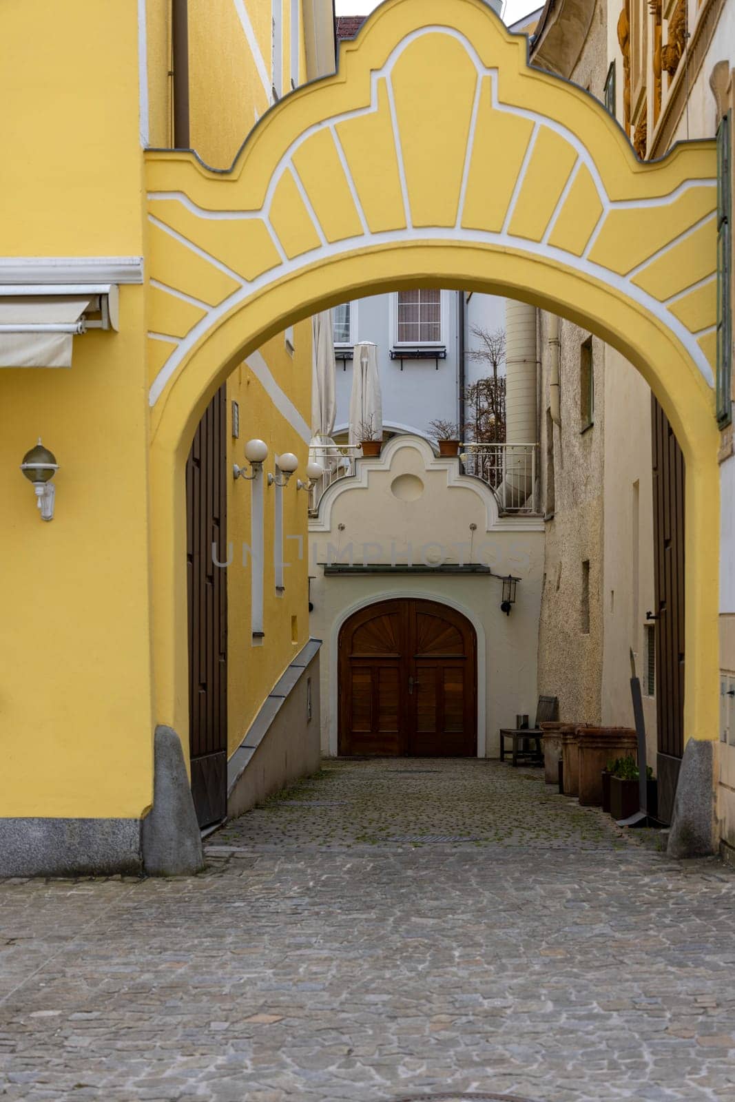 Melk, Austria - February 24, 2023: Arcade courtyard between historic tenement houses on the Linzer street