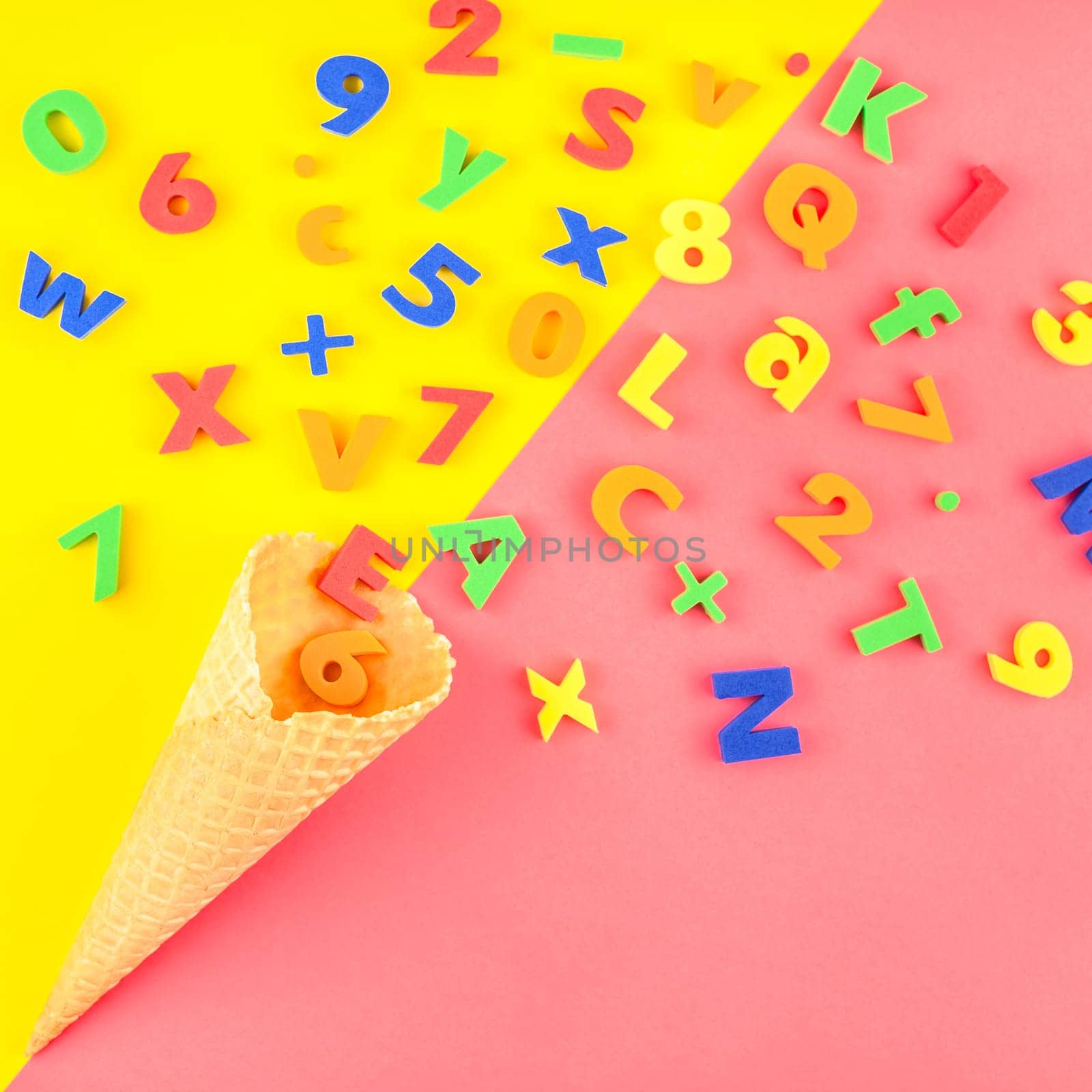 Square Creative flat lay back to school concept with waffle cone and welcome letters message on bright yellow and pink paper background with copy space, template for text or design