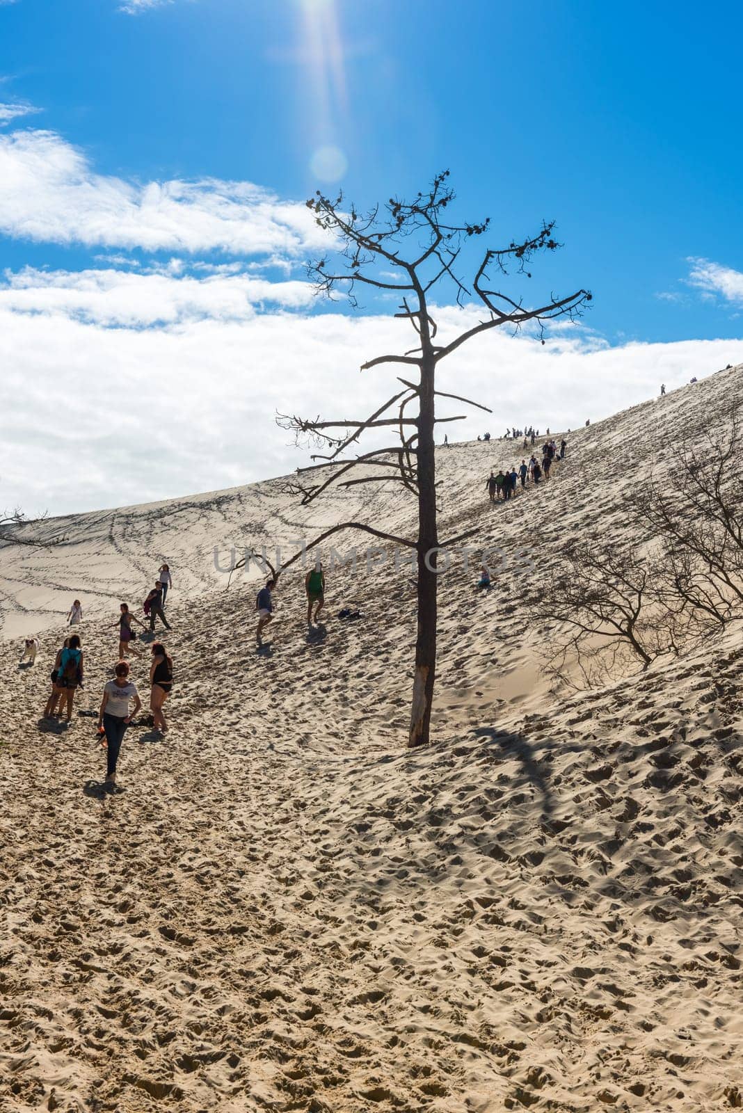 FRANCE, LA TESTE-DE-BUCH - SEPTEMBER 19: people visiting the famous highest sand dune in Europe Dune of Pyla on September 19, 2015