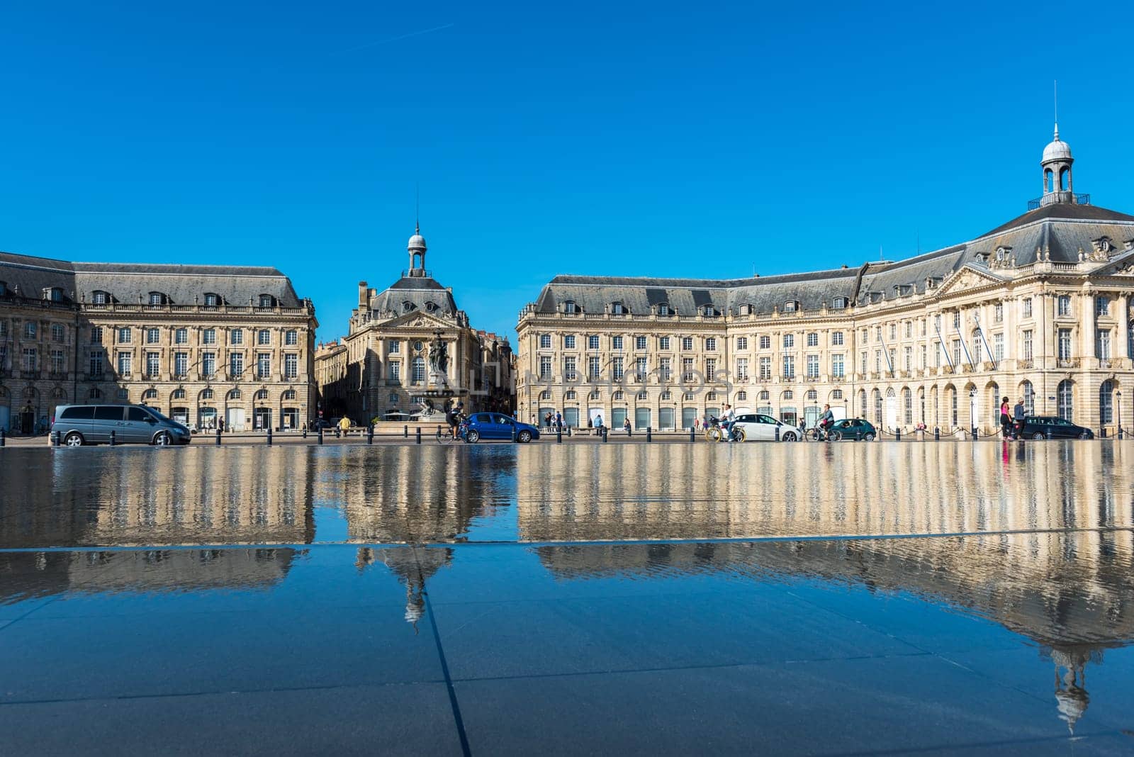 FRANCE, BORDEAUX - SEPTEMBER 20: Famous mirror fountain in front of Place de la Bourse in Bordeaux, France on September 20, 2015