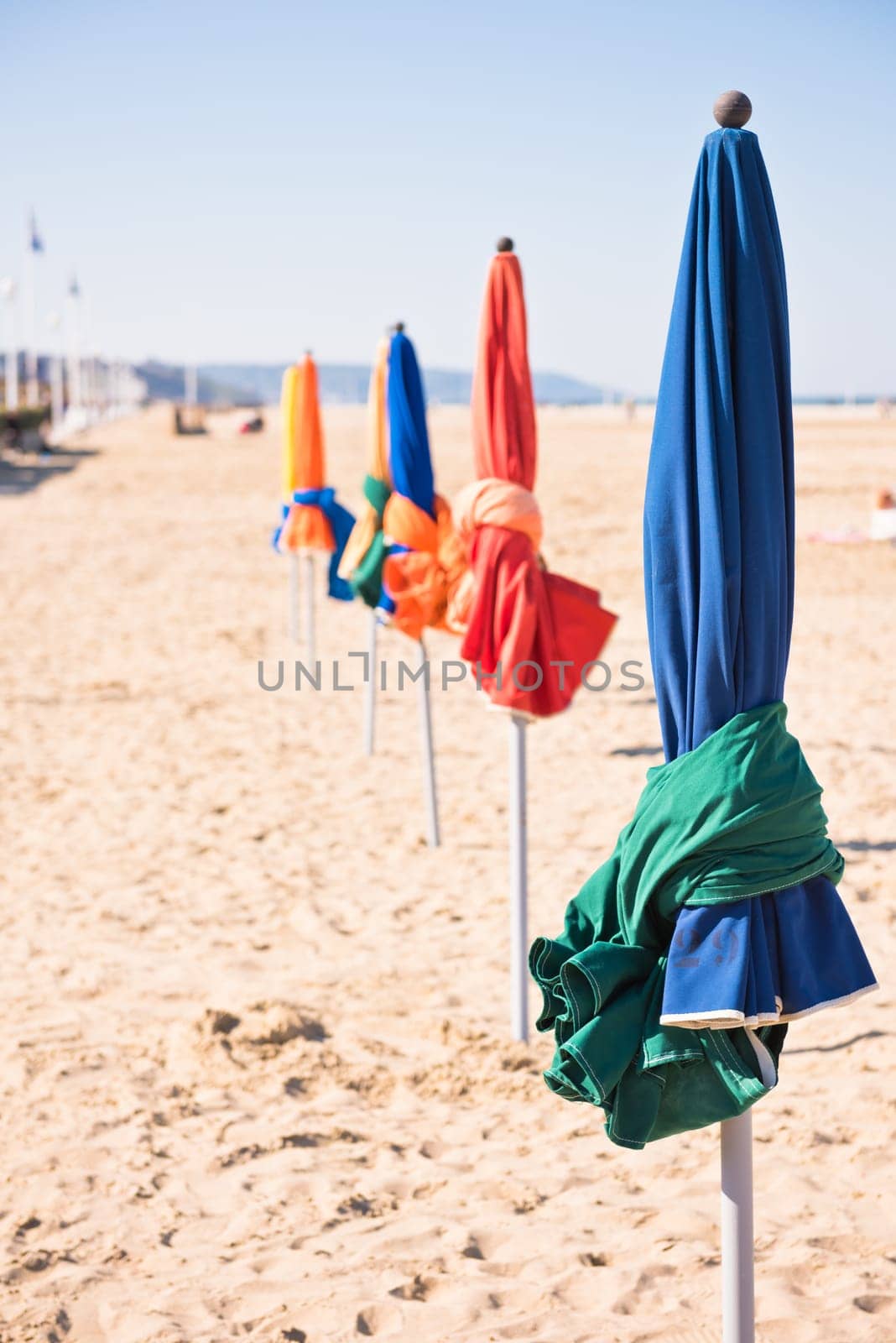 The famous colorful parasols on Deauville beach, Normandy, Northern France