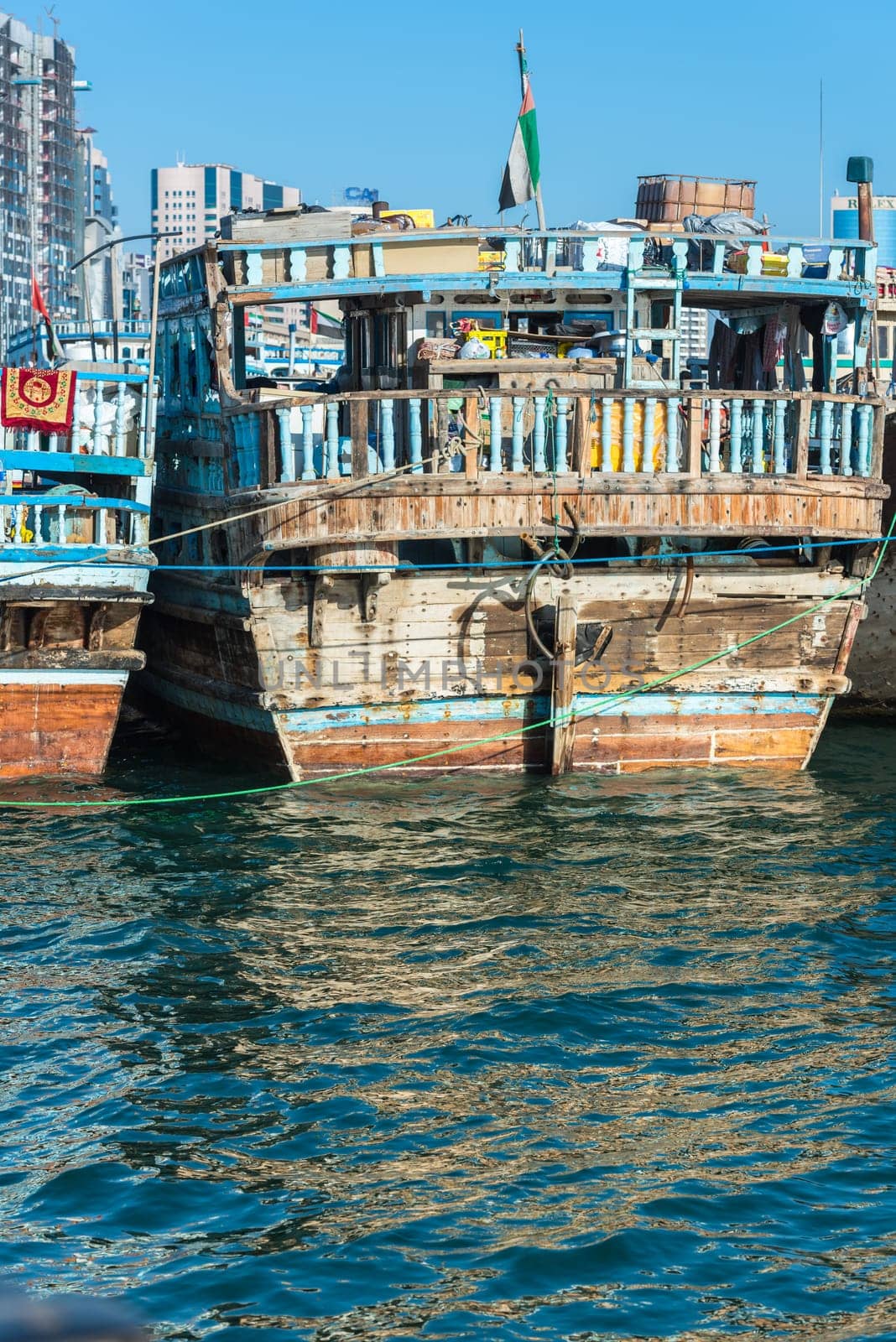 UAE, DUBAI - DECEMBER 27: traditional arabic cargo boats at Dubai creek on December 27, 2014