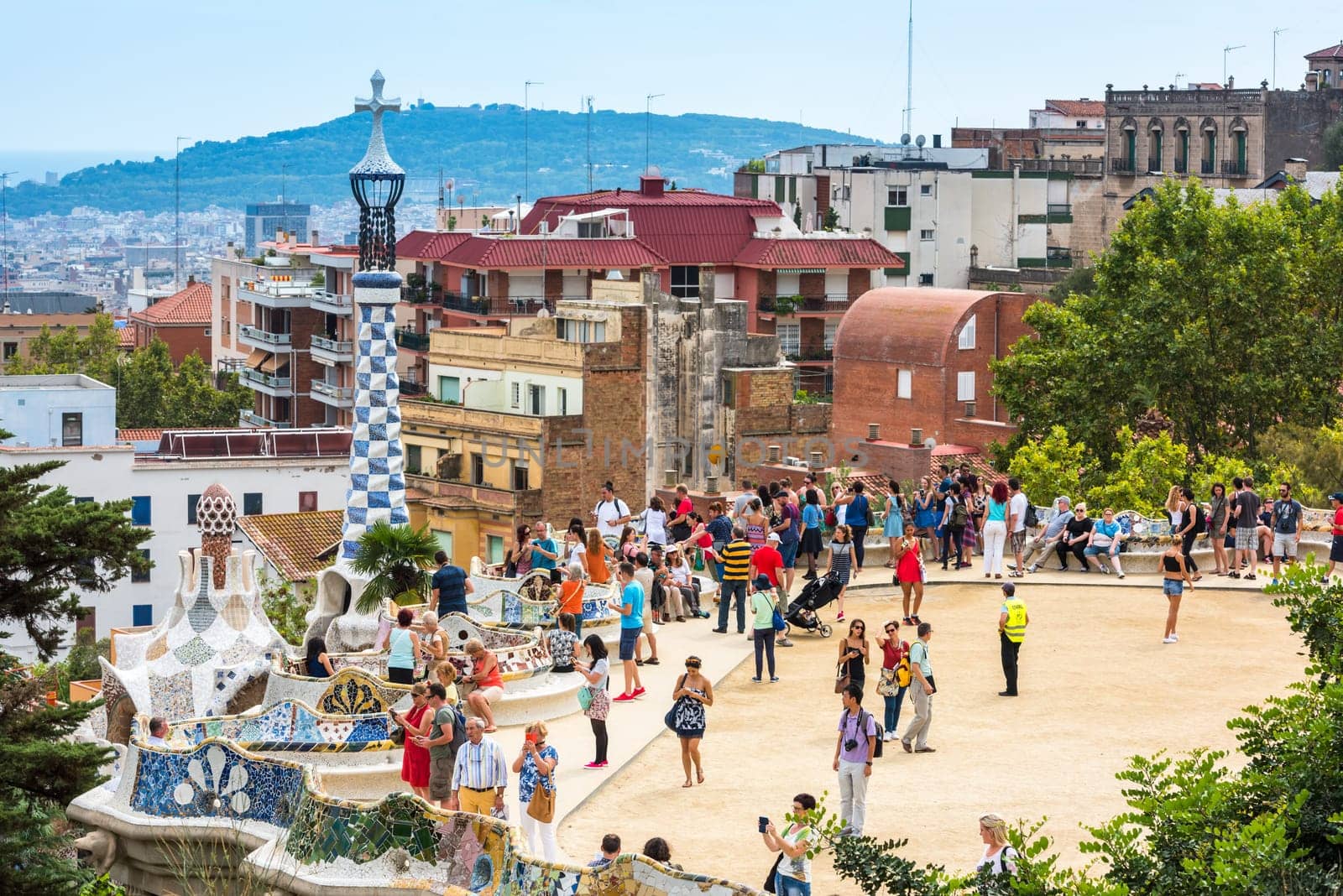 SPAIN, BARCELONA - SEPTEMBER 13: Tourists in Park Guell, Barcelona, Spain on September 13, 2015