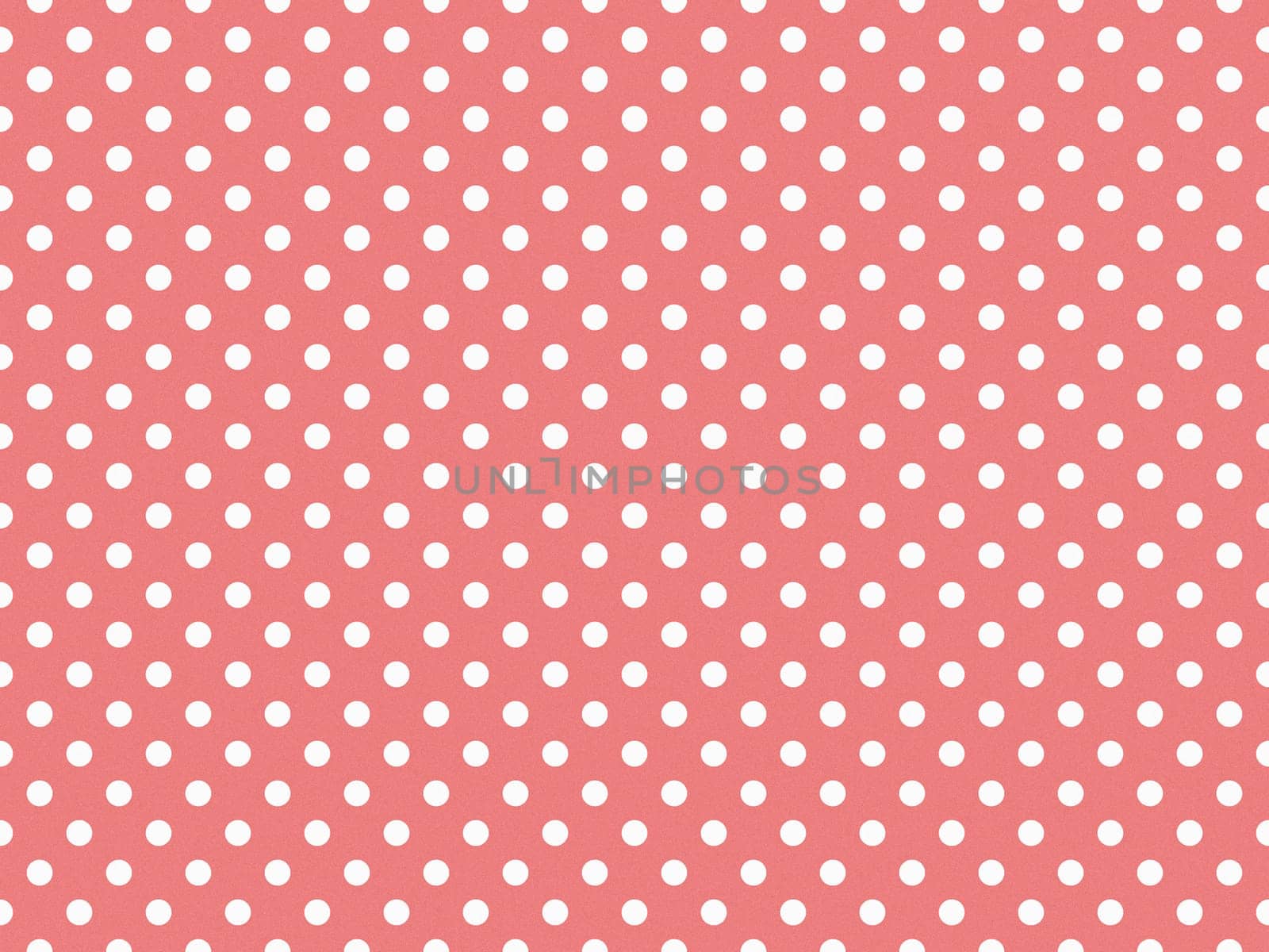 texturised white colour polka dots pattern over light coral red useful as a background