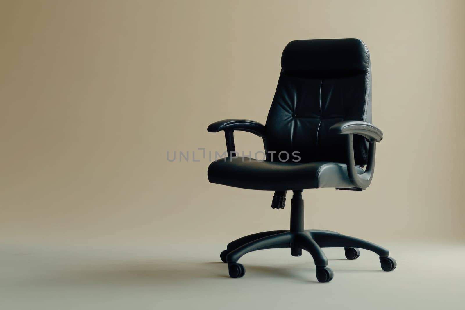 The office chair is pulled out, sitting on a smooth, clean surface. The background is neutral, creating a calm setting suitable for focused work or meetings.