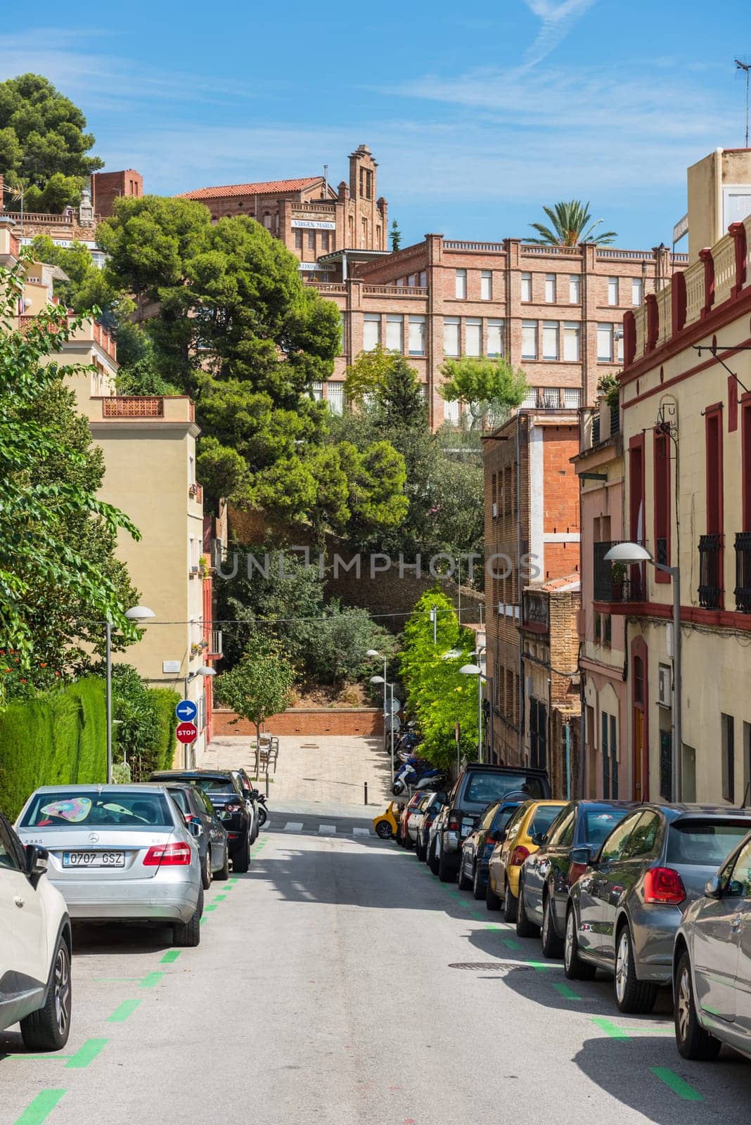 SPAIN, BARCELONA - SEPTEMBER 13: Cars parking on Barcelona street on September 13, 2015