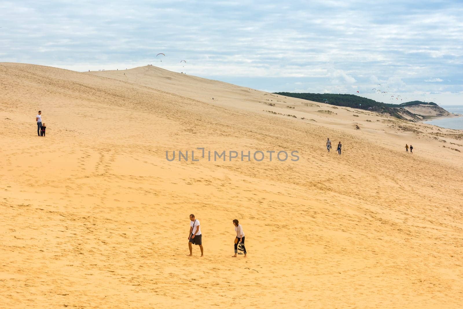 FRANCE, LA TESTE-DE-BUCH - SEPTEMBER 19: people visiting the famous highest sand dune in Europe Dune of Pyla on September 19, 2015