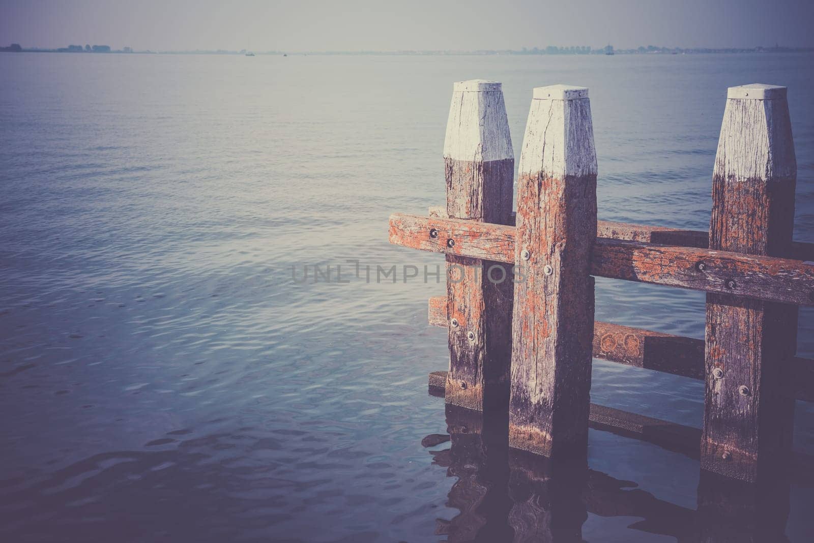 Northern Sea landscape: still water and wooden pier