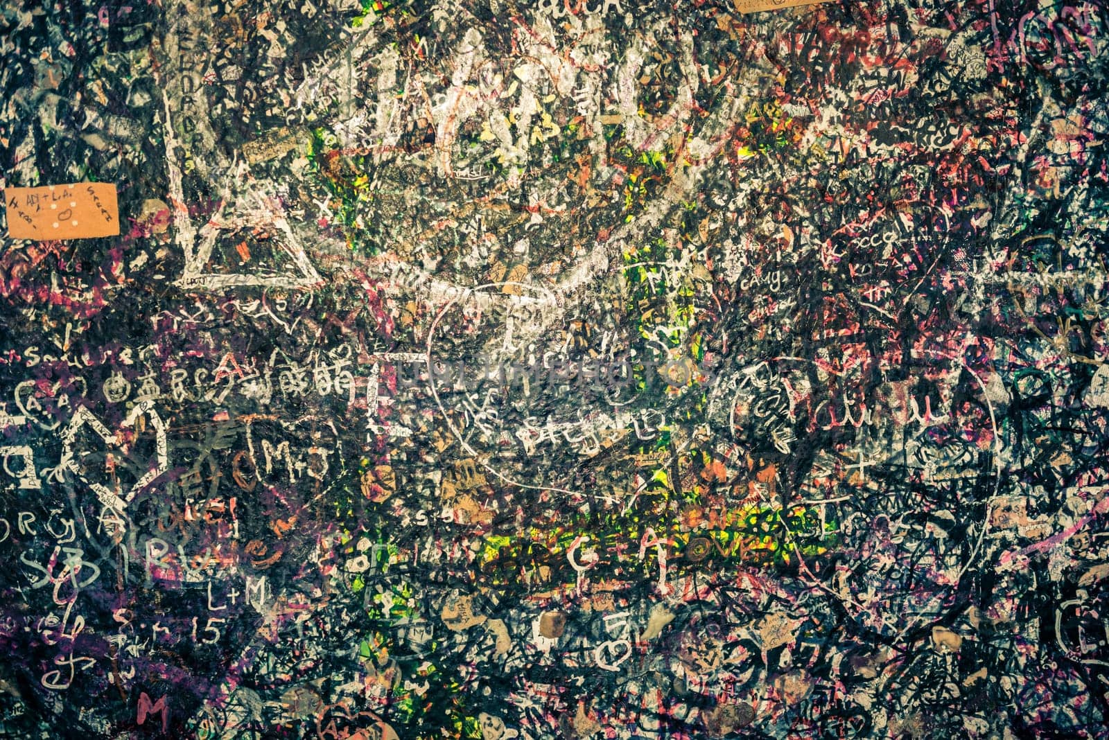 The wall full of messages from lovers in Juliet house, Verona, Italy.