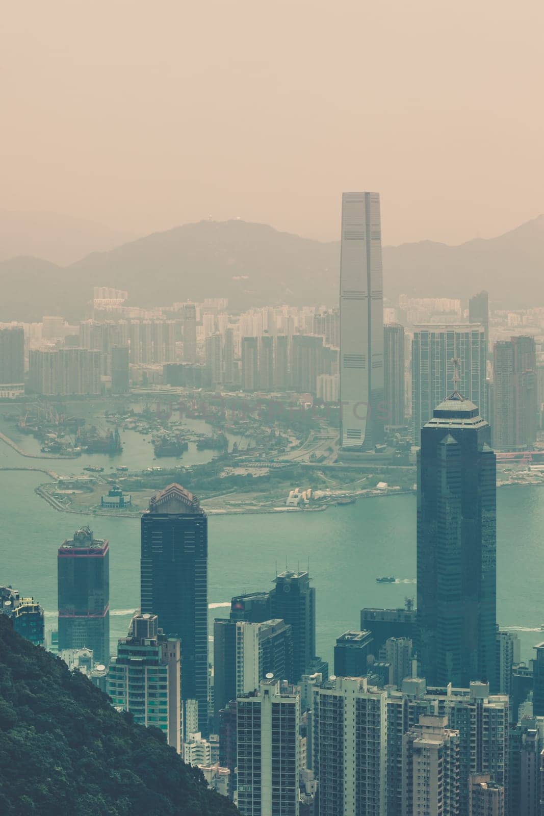 Haze Hong Kong downtown view from Victoria peak. Filtered shot