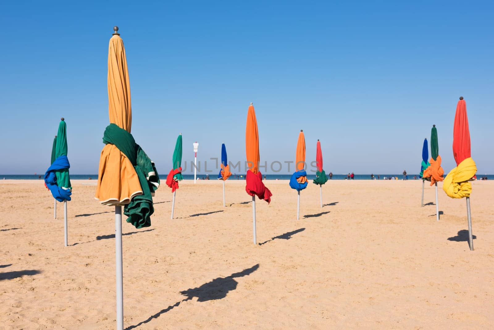 The famous colorful parasols on Deauville beach, Normandy, Northern France