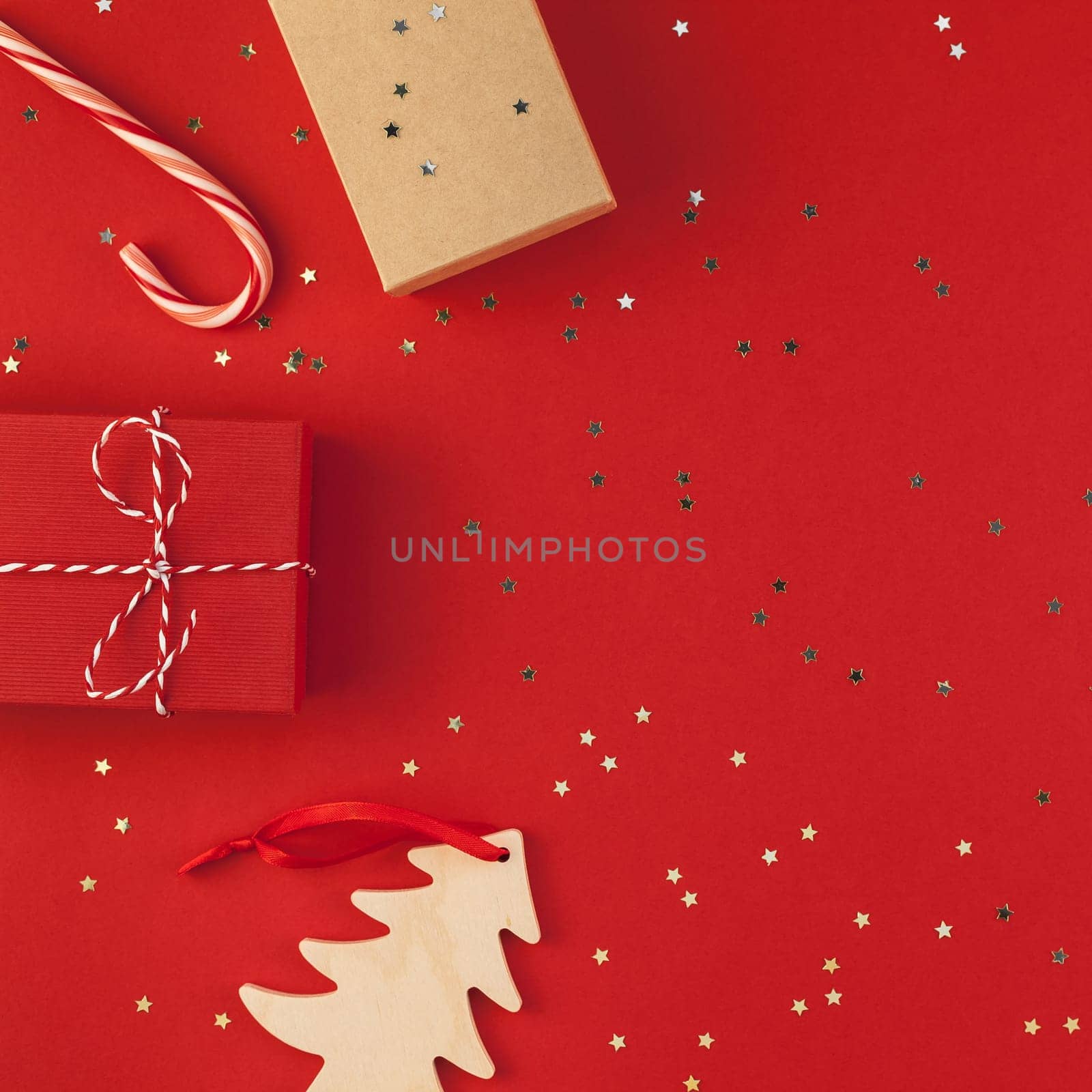 New Year Christmas presents ribbon flat lay top view Xmas holiday 2019 celebration handmade gift boxes red paper golden sparkles background copyspace. Square Template mockup greeting card text design