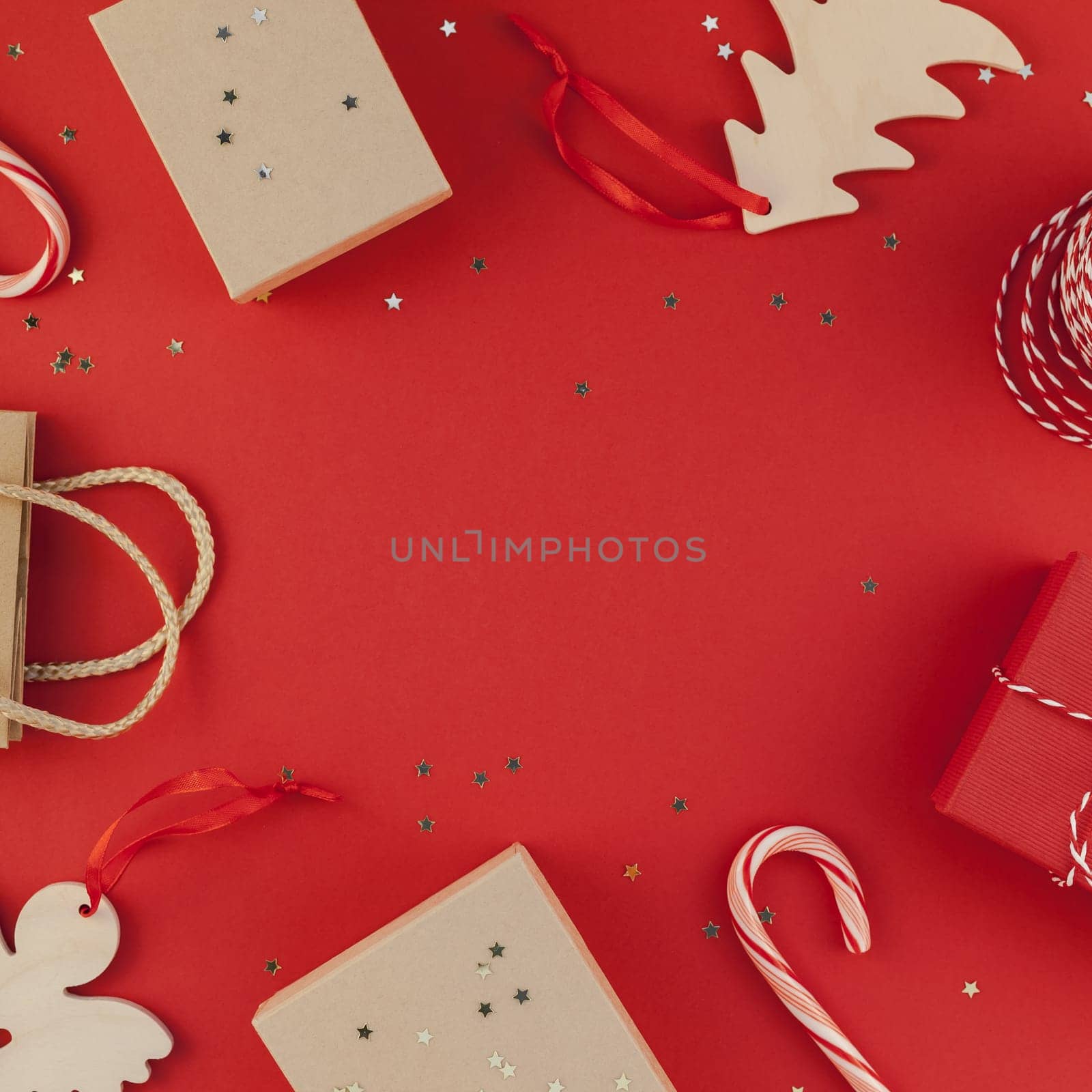 New Year Christmas presents ribbon flat lay top view Xmas holiday 2019 celebration handmade gift boxes red paper golden sparkles background copyspace. Square Template mockup greeting card text design