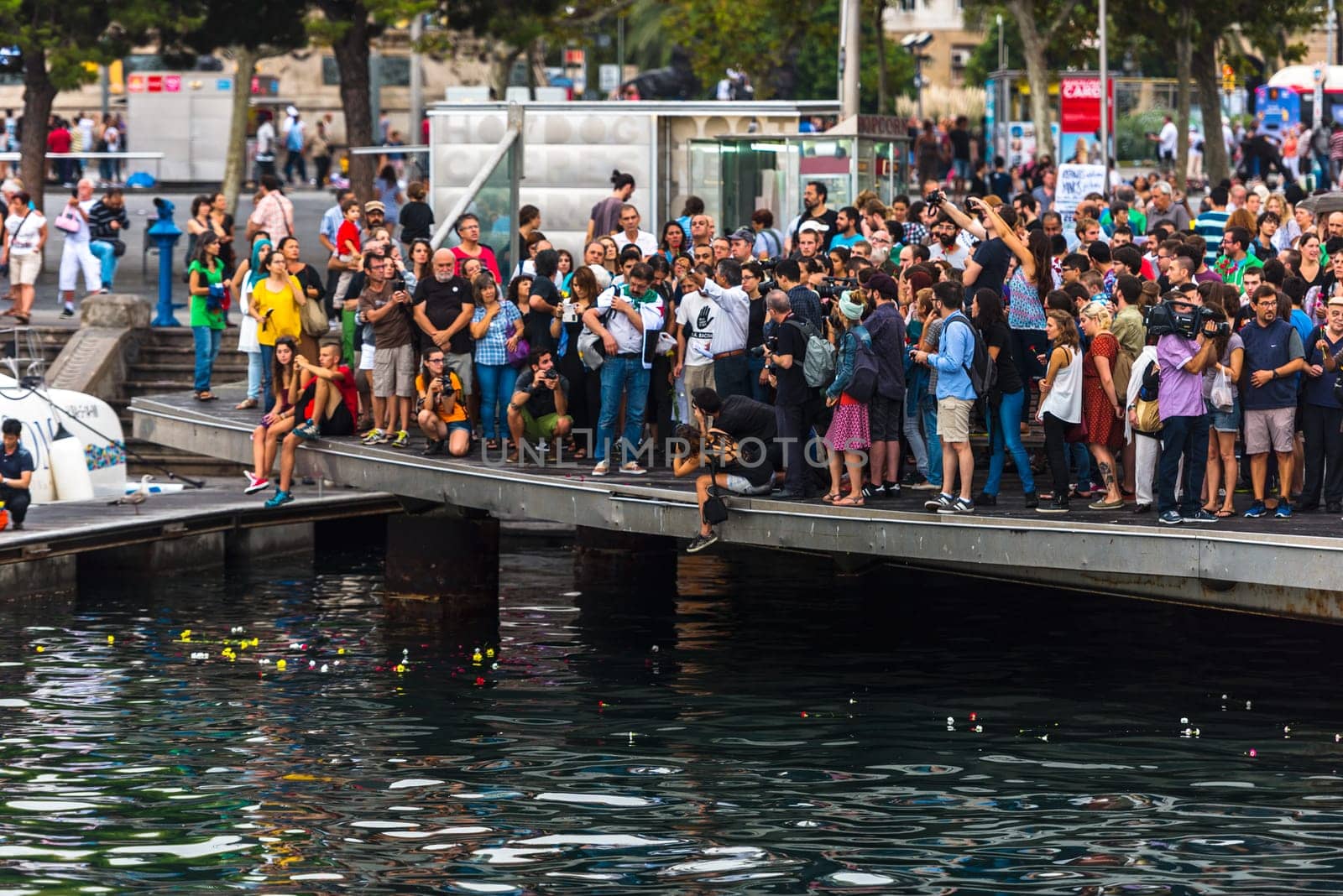 SPAIN, BARCELONA - SEPTEMBER 12: crowd of people on the pier on September 12, 2015