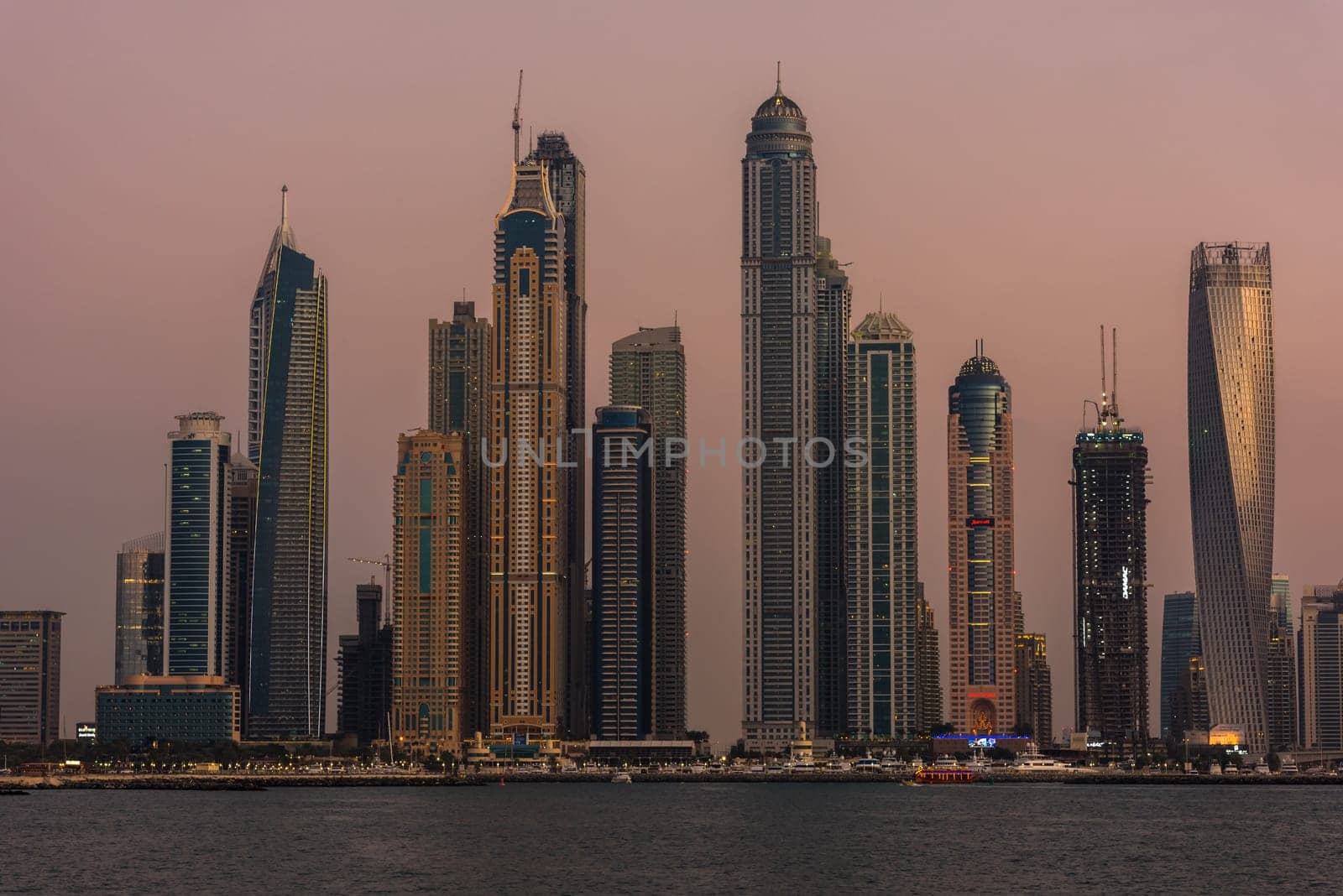 UAE, DUBAI - DECEMBER 28: Evening cityscape of Dubai city, United Arab Emirates on December 28, 2014