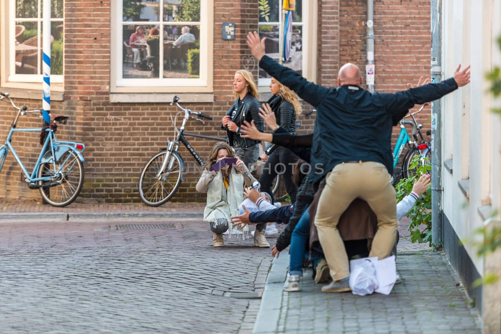 NETHERLANDS, UTRECHT - OCTOBER 01: people having fun on the street of Utrecht on October 1, 2015