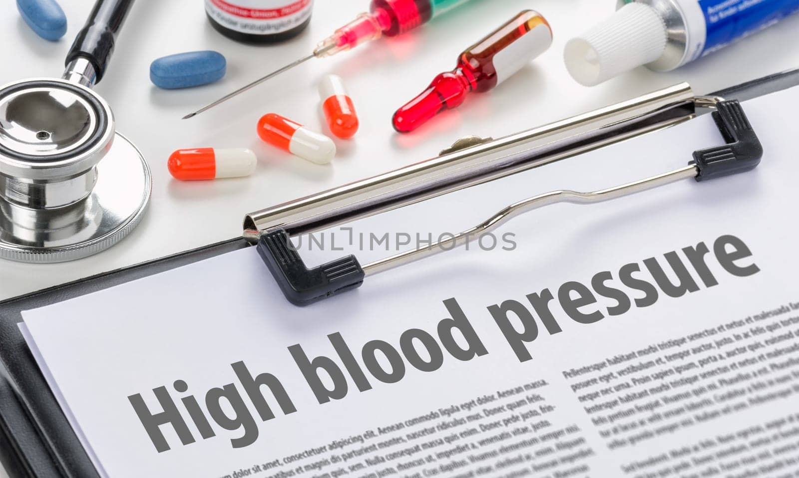 High blood pressure written on a clipboard
