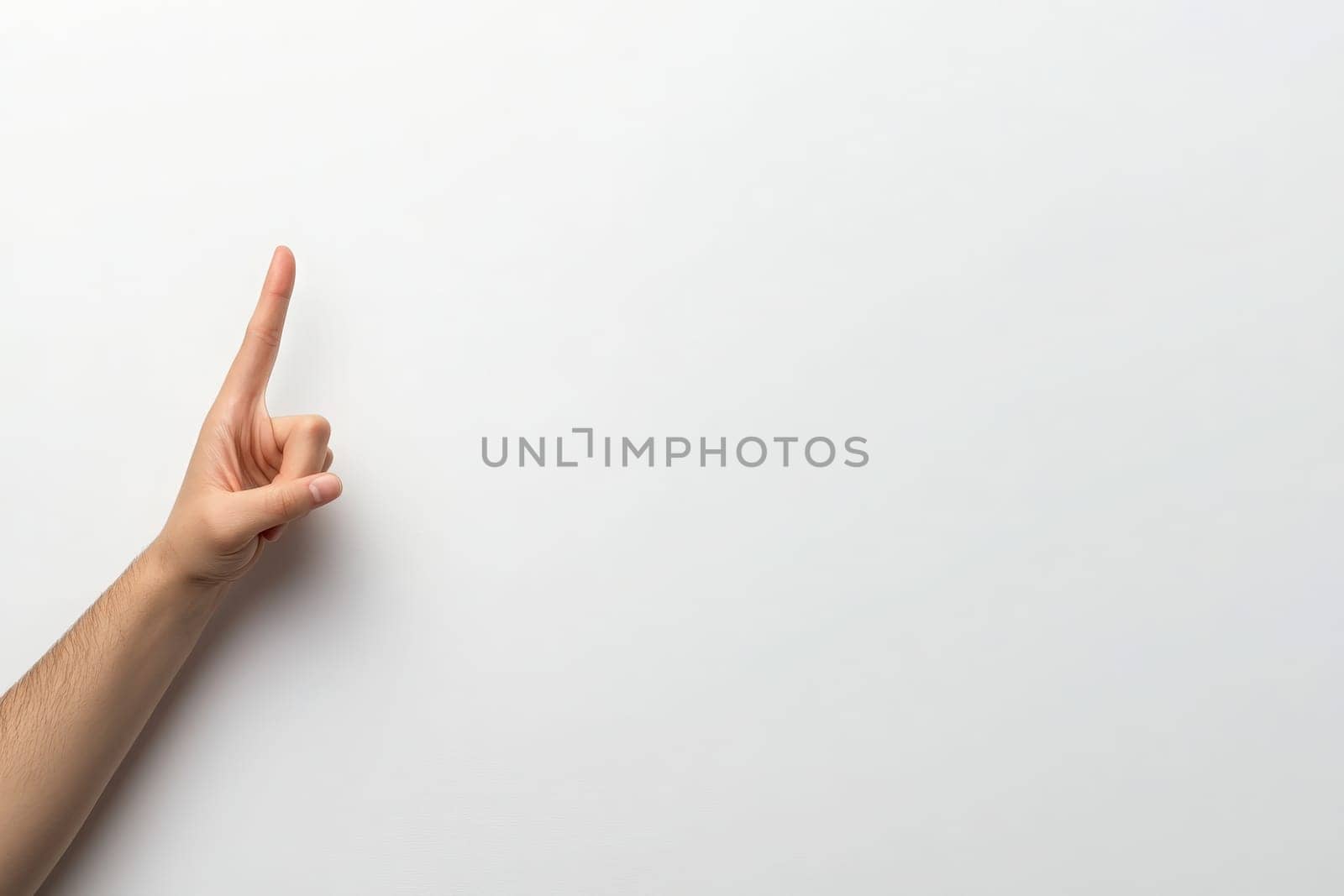 A hand displays a peace sign, symbolizing unity and harmony. The gesture stands out against a pure white background, conveying a calm and positive message.