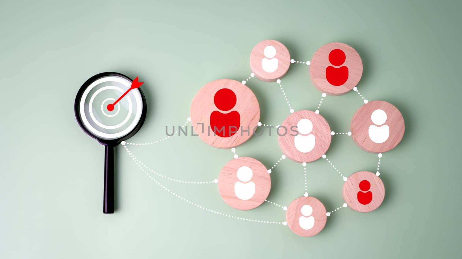 Target icon on circular wooden linked with human icons for customer focus group, Customer relationship management concept, CRM, Customer relationship management and targeted marketing strategies.