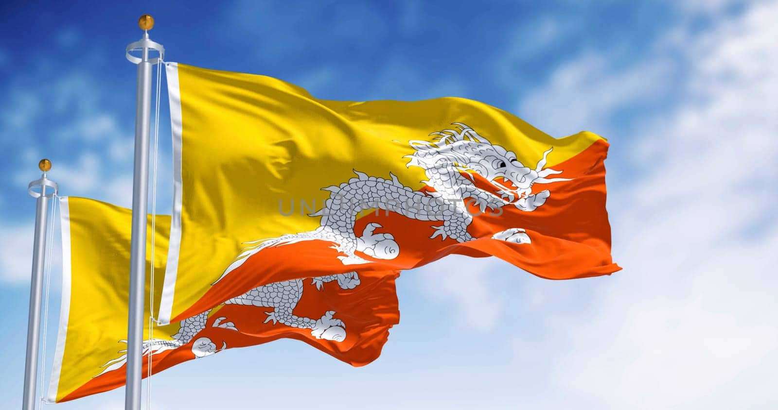 Close-up of two Bhutan national flags waving in the wind. Yellow upper triangle and an orange lower triangle, featuring a white dragon holding jewels in the center. 3d illustration render.
