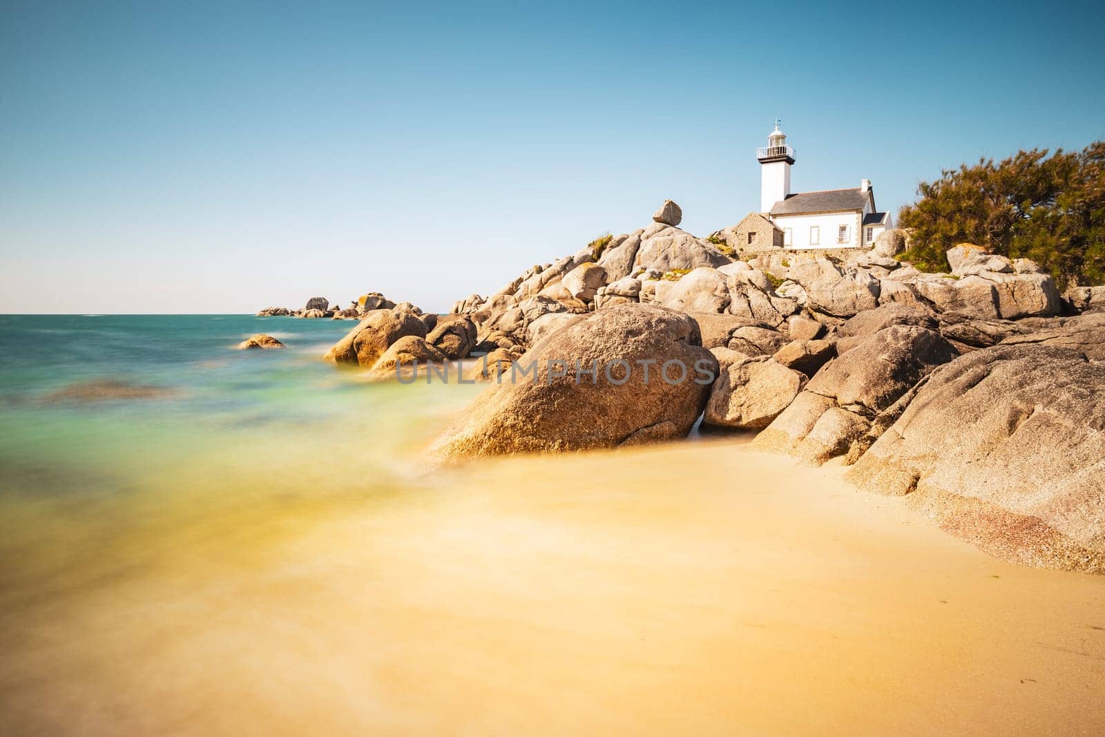 Pontusval lighthouse photographed in long exposure in Kerlouan, northern Brittany, France