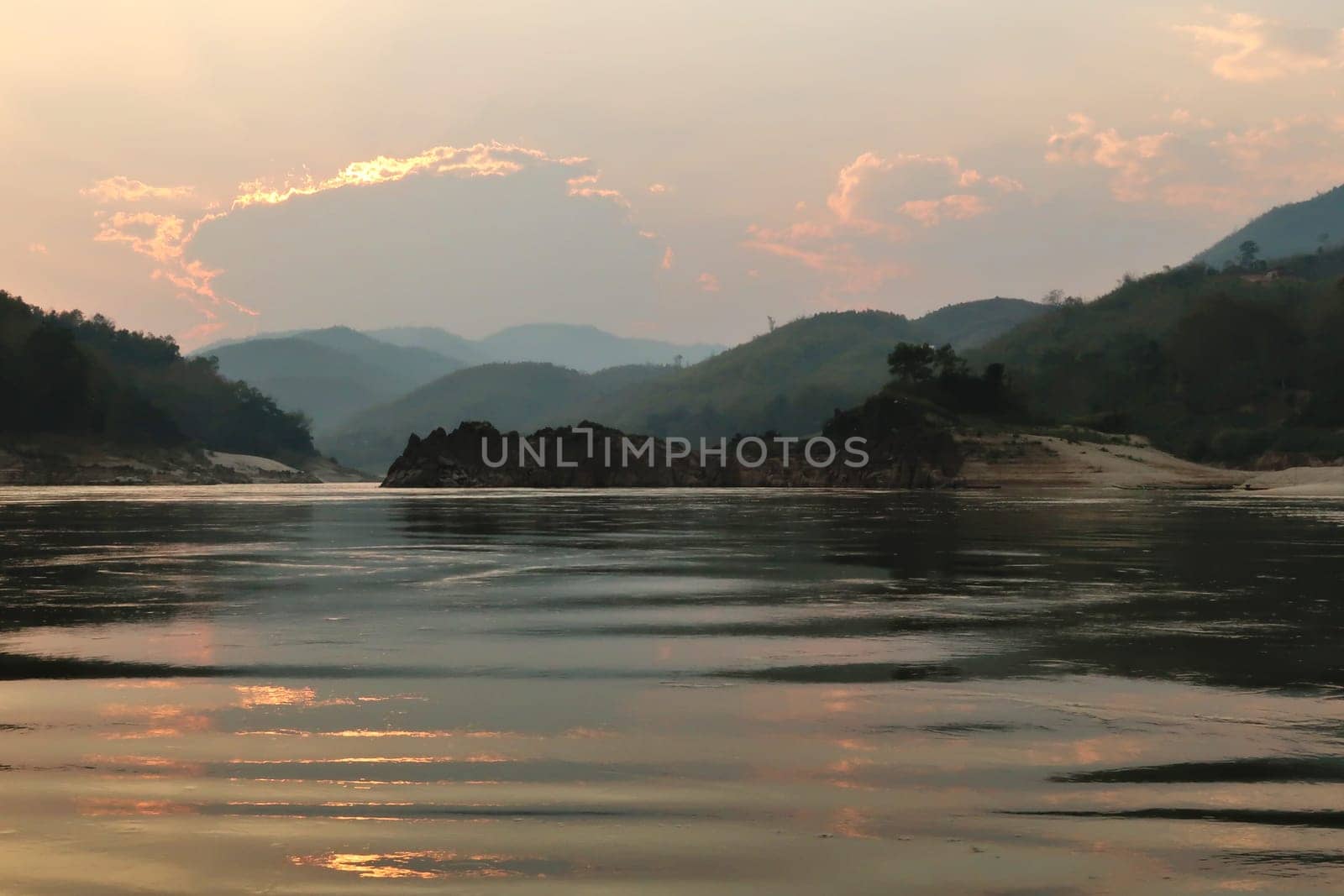 View from the slow boat from Thailand to Laos after sunset, Laos 2023