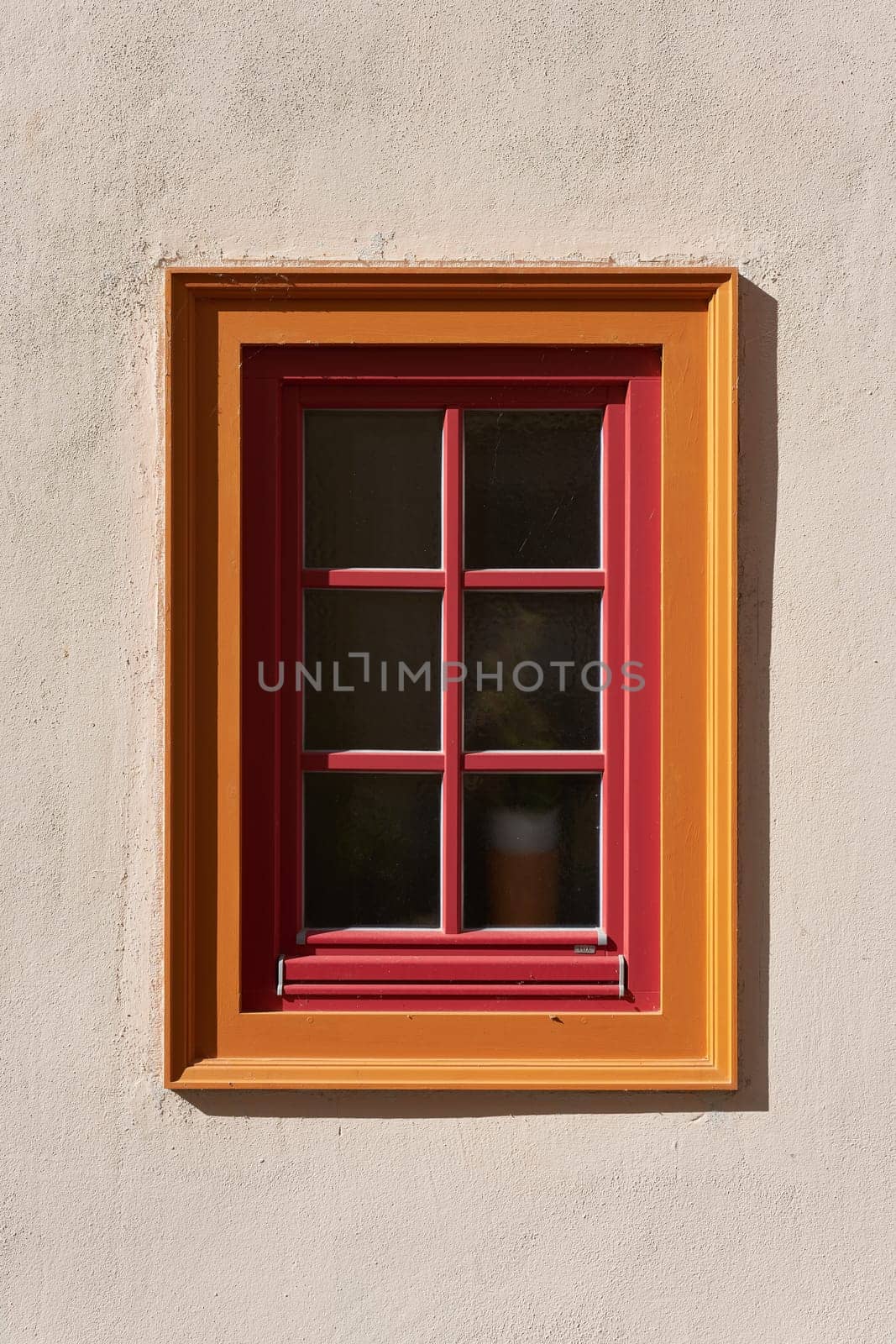Wooden window on the facade of a renovated house in the old town of Erfurt in Germany