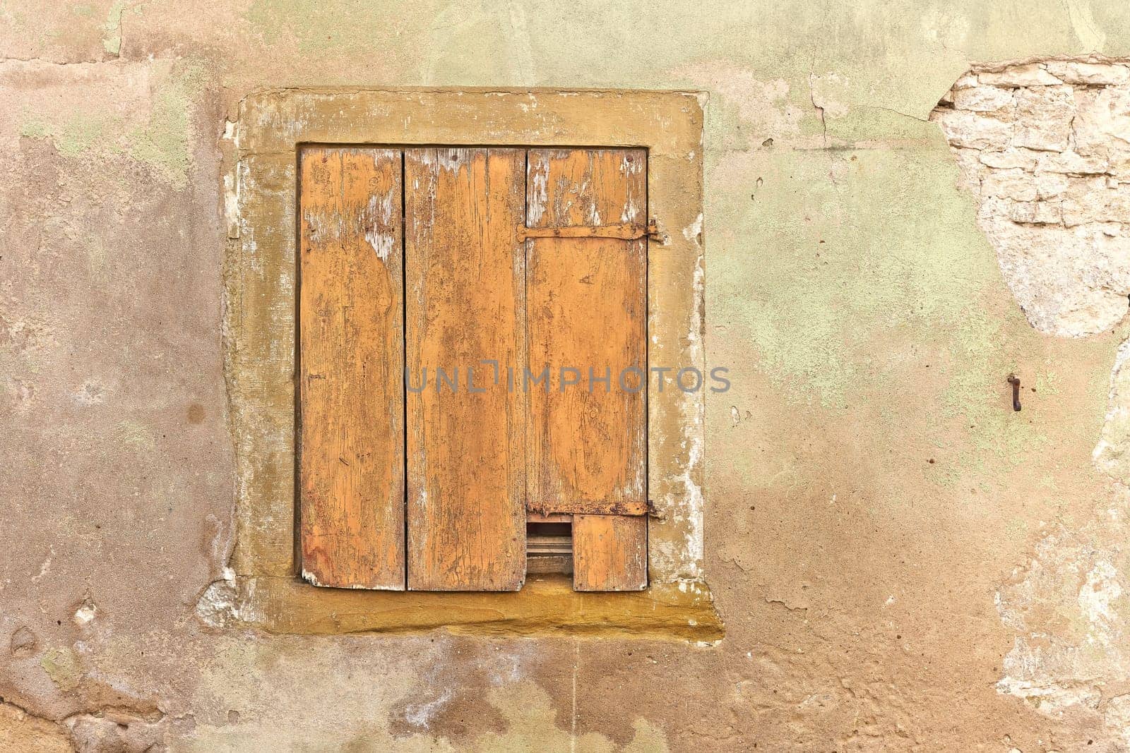Shutters on an unrenovated medieval house in the old town of Rothenburg ob der Tauber in Germany