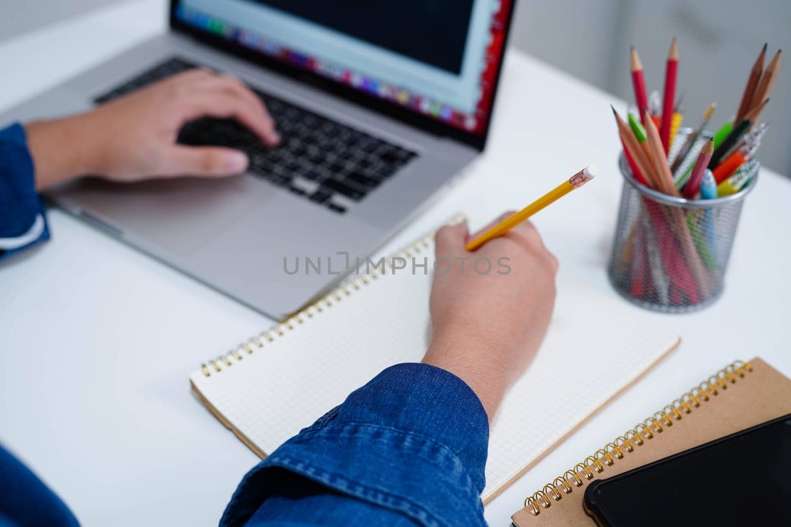 Teenage using tablet for communication, search data internet website to learn.