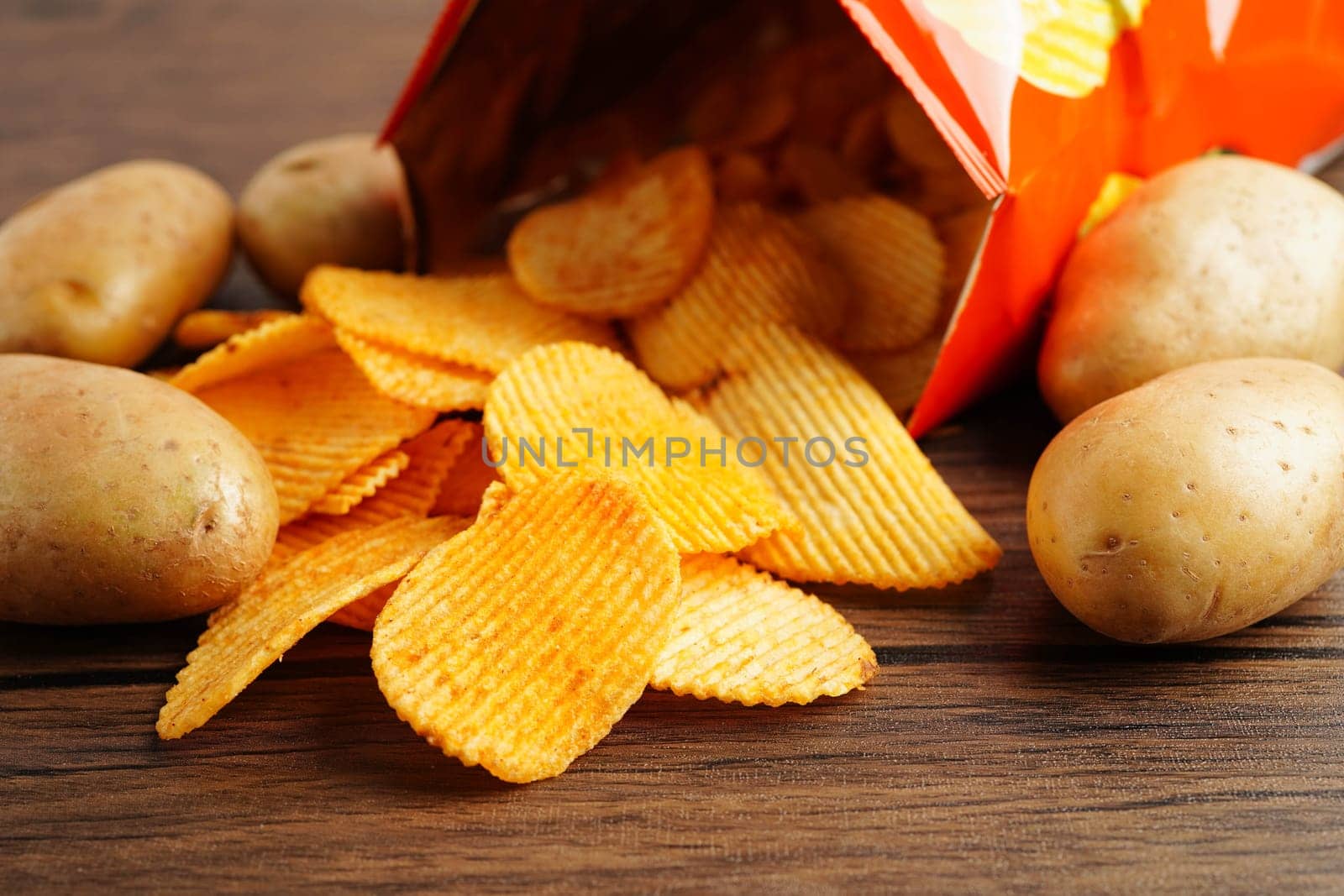 Potato chips , delicious BBQ seasoning spicy for crips, thin slice deep fried snack fast food.